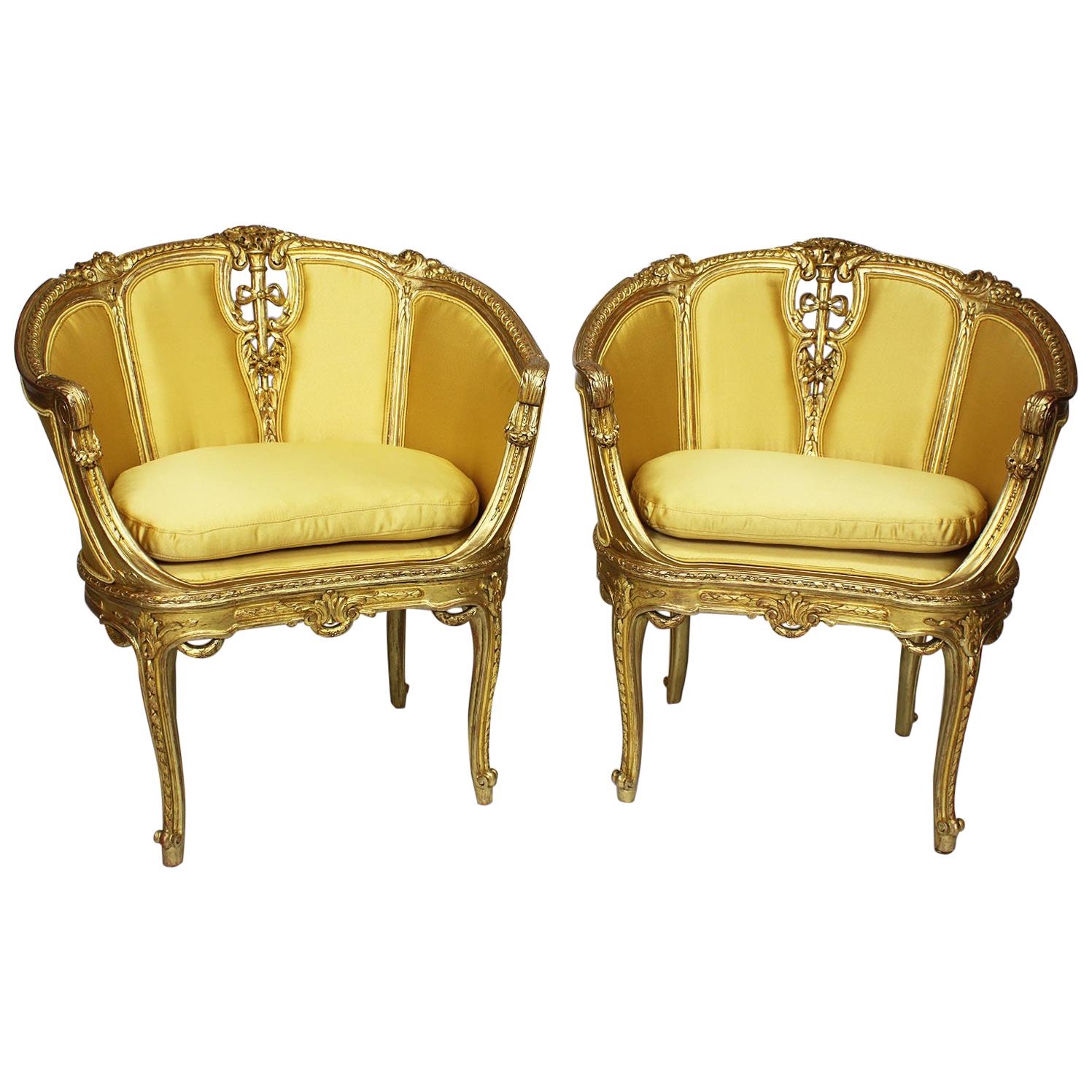 Coppia di poltrone Bergère intagliate in legno dorato in stile Belle Époque Luigi XV francese