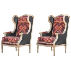 Pair of French Bergère Two-Toned Cane and Kilim Rug Wingback Lounge Chairs