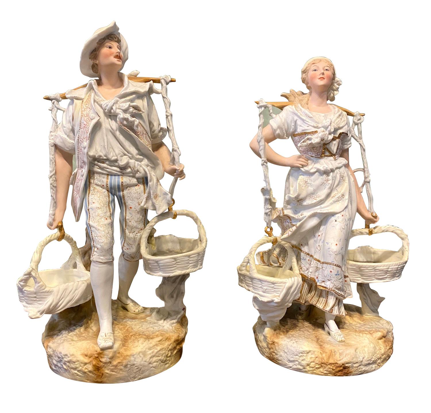 Pair of French Bisque Porcelain Hand Painted Figural Sculptures, Circa 1900
Depicting male and female fruit pickers 
