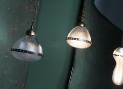 Pair of French Bistro Brass and Prismatic Glass Holophane Pendants