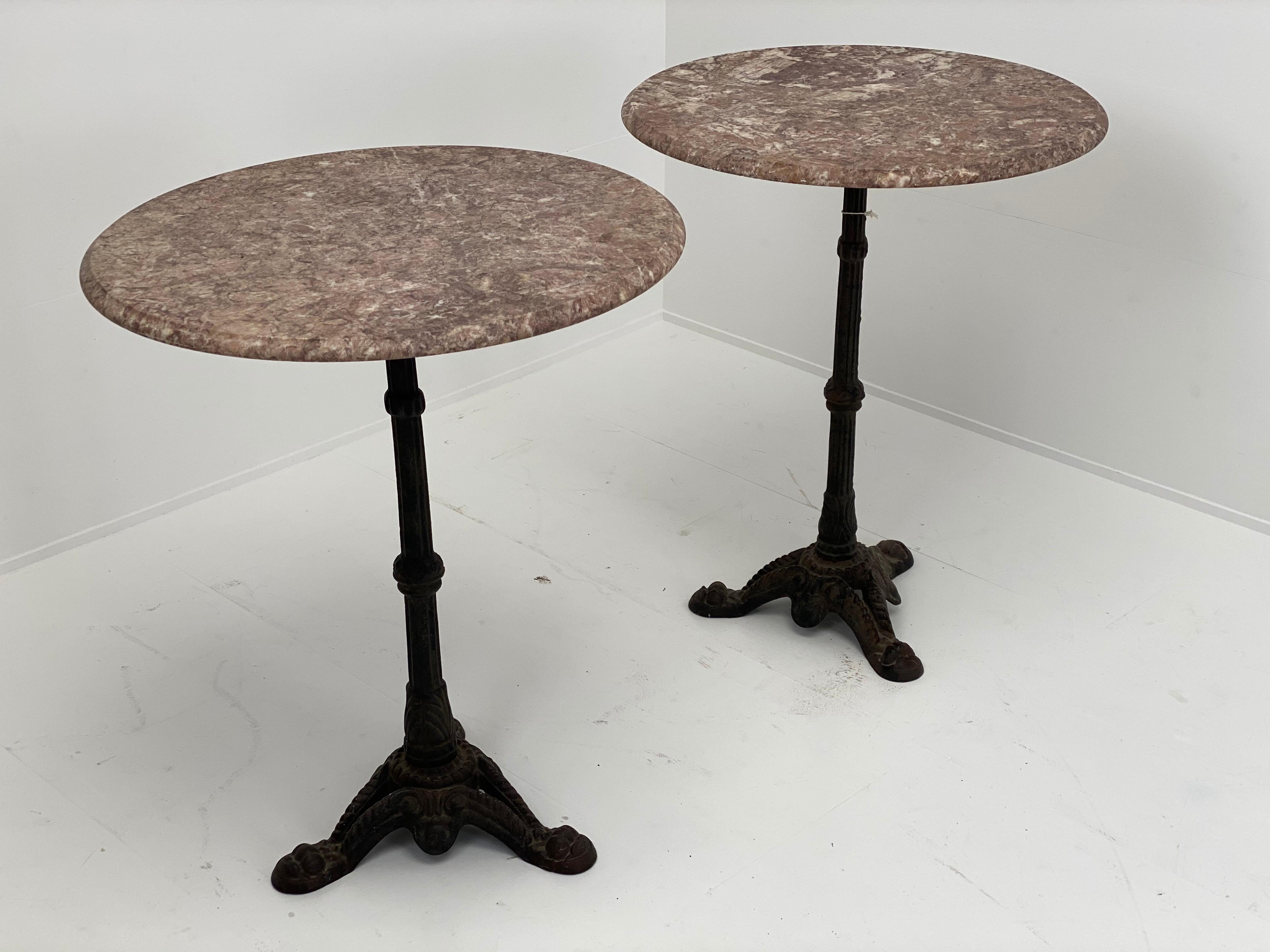 Beautiful pair of French bistro tables, France, circa 1960
great brown-red marble top with white veining on a central fluted pillar that rest on three legs,
gorgeous Patina and solid construction,
very decorative with multi-use in each