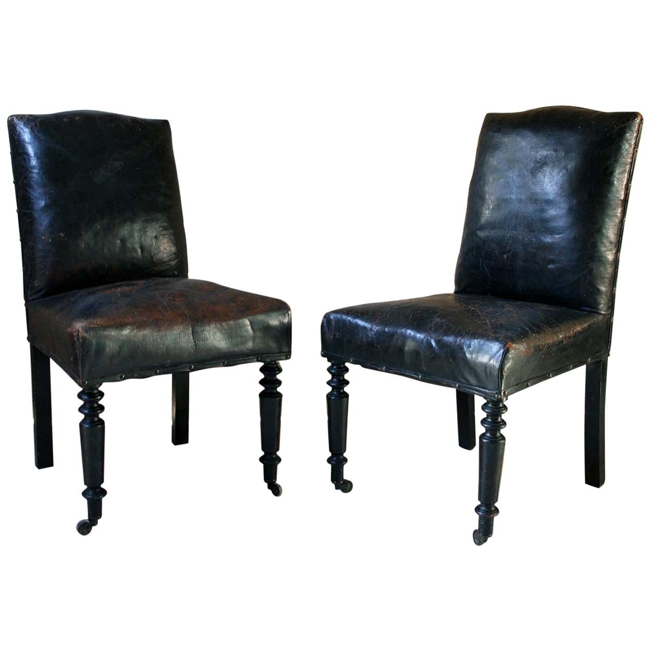Pair of French Black Leather Upholstered and Ebonized Library Chairs, circa 1880