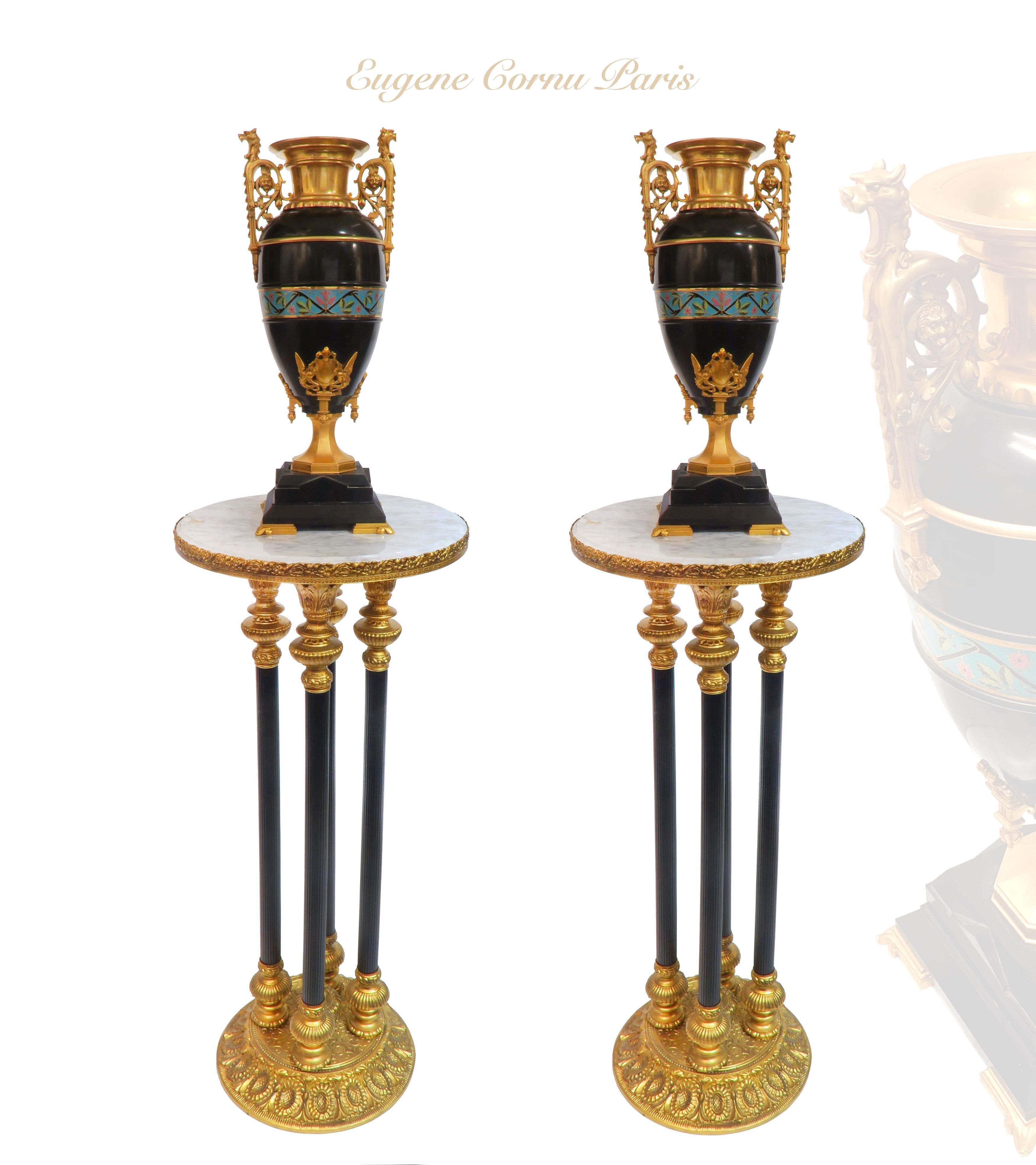 Pair of 19th C. French black marble & champleve enamel gilt bronze vases By Eugene Cornu.

D: 18