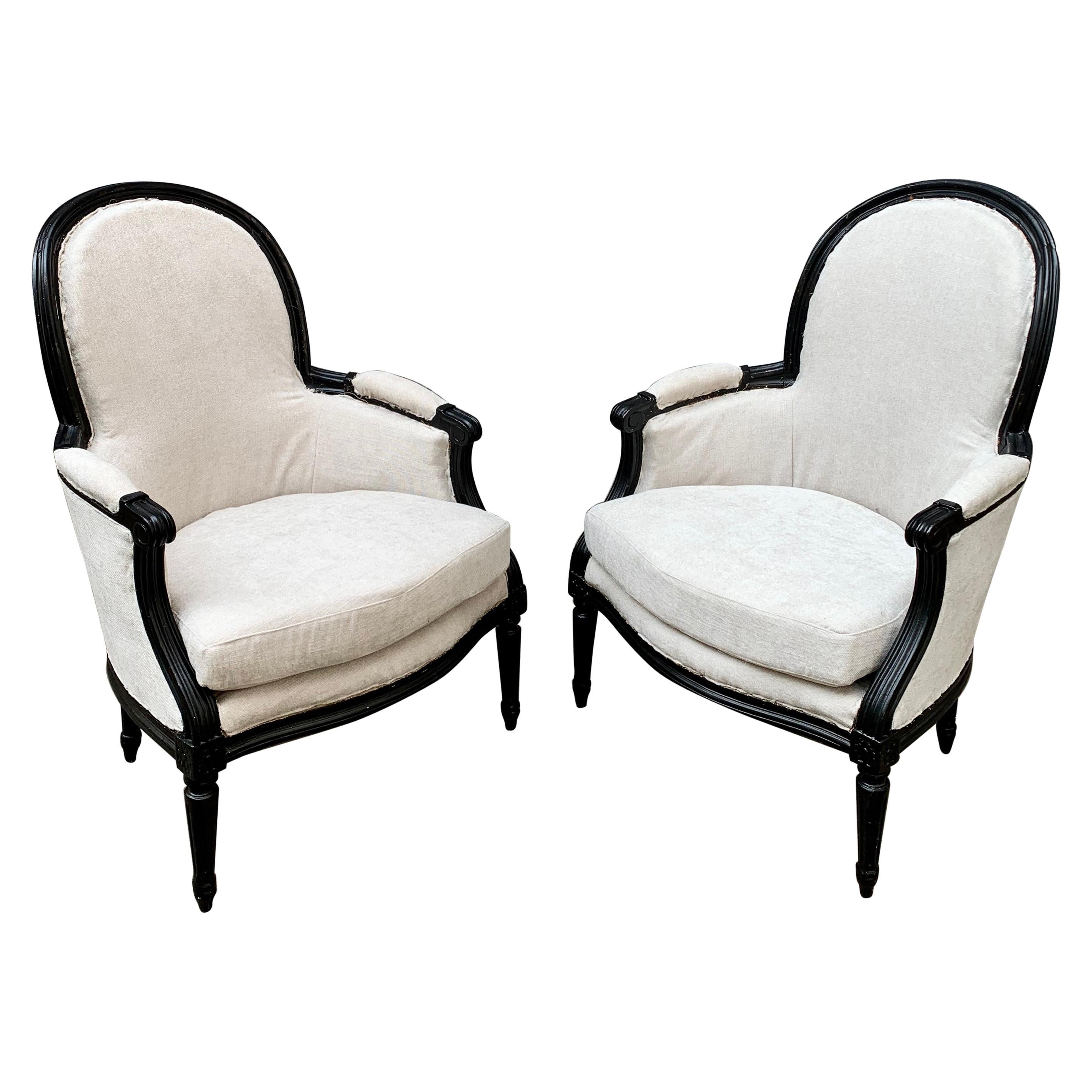 Pair of French Black Painted Louis XVI Styler Bergère Armchairs