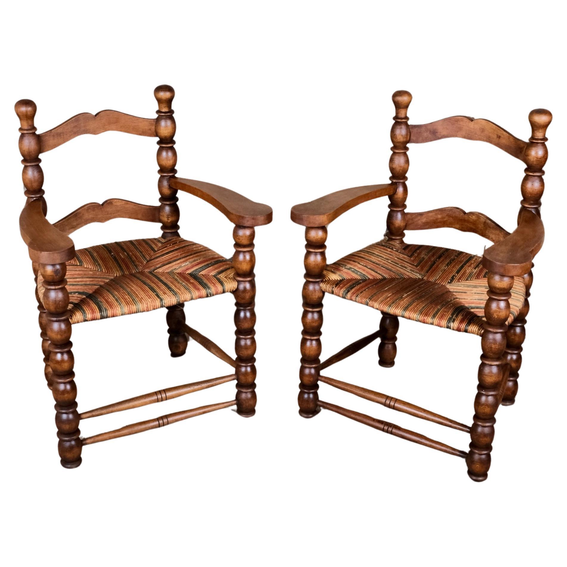 Pair of French bobbin armchairs in the style of Charles Dudouyt, 1940-50s For Sale