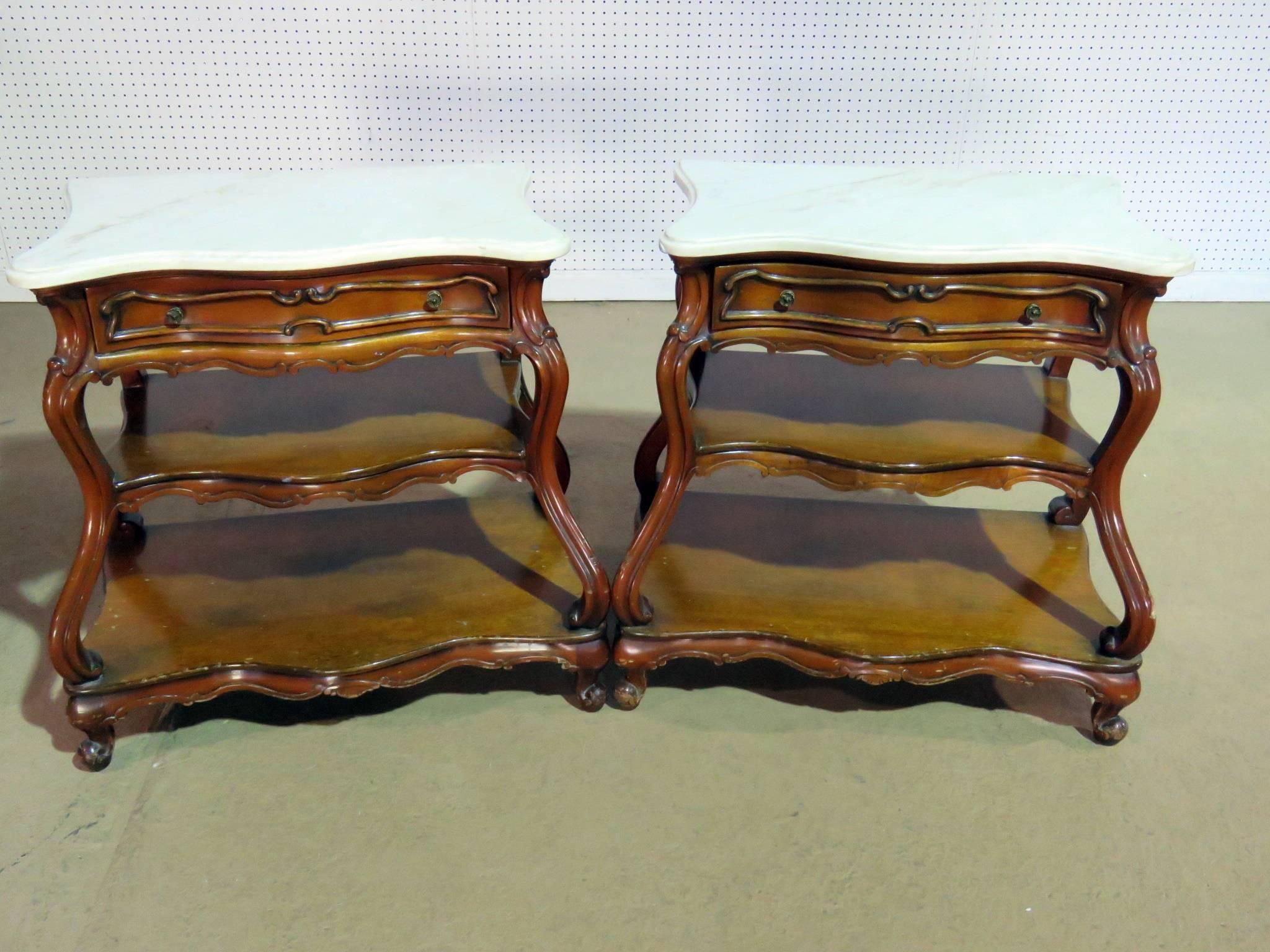 Pair of French marble-top Bombay end tables with one drawer, in the manner of Auffray.