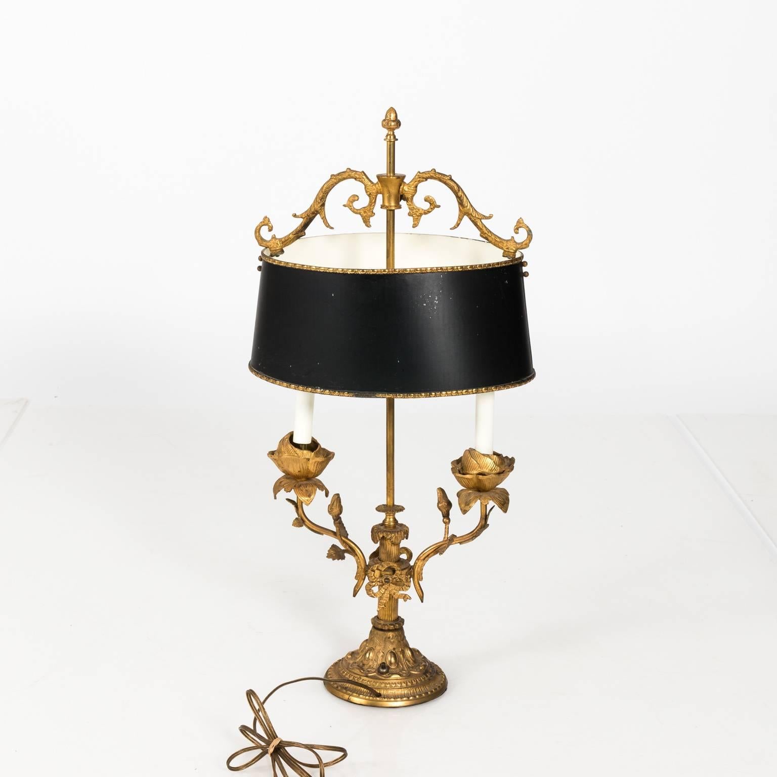 Pair of gilded lead two light bouillotte lamps with rose flower arms and matching shades, circa early 20th century.
 