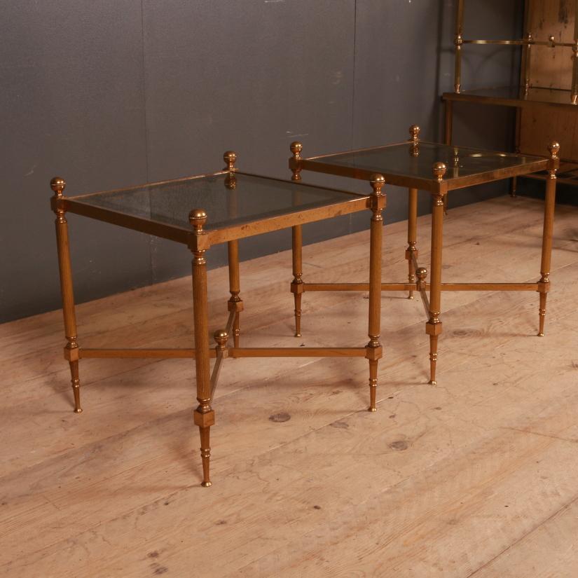 Pair of 20th century French brass and glass lamp tables, 1950.

Dimensions
15.5 inches (39 cms) wide
15.5 inches (39 cms) deep
16.5 inches (42 cms) high.

   