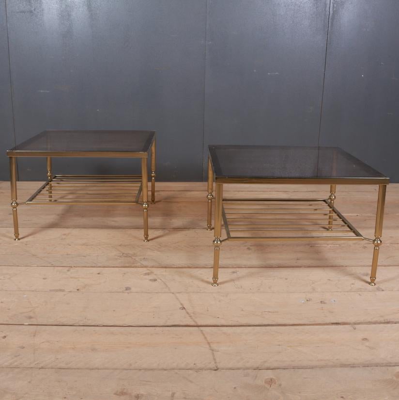 Large pair of 1950s French brass and smoked glass lamp tables with slatted underteirs, 1950

Dimensions:
24 inches (61 cms) wide
24 inches (61 cms) deep
16 inches (41 cms) high.

