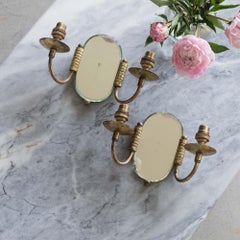 Pair of French Brass and Mirror Sconces