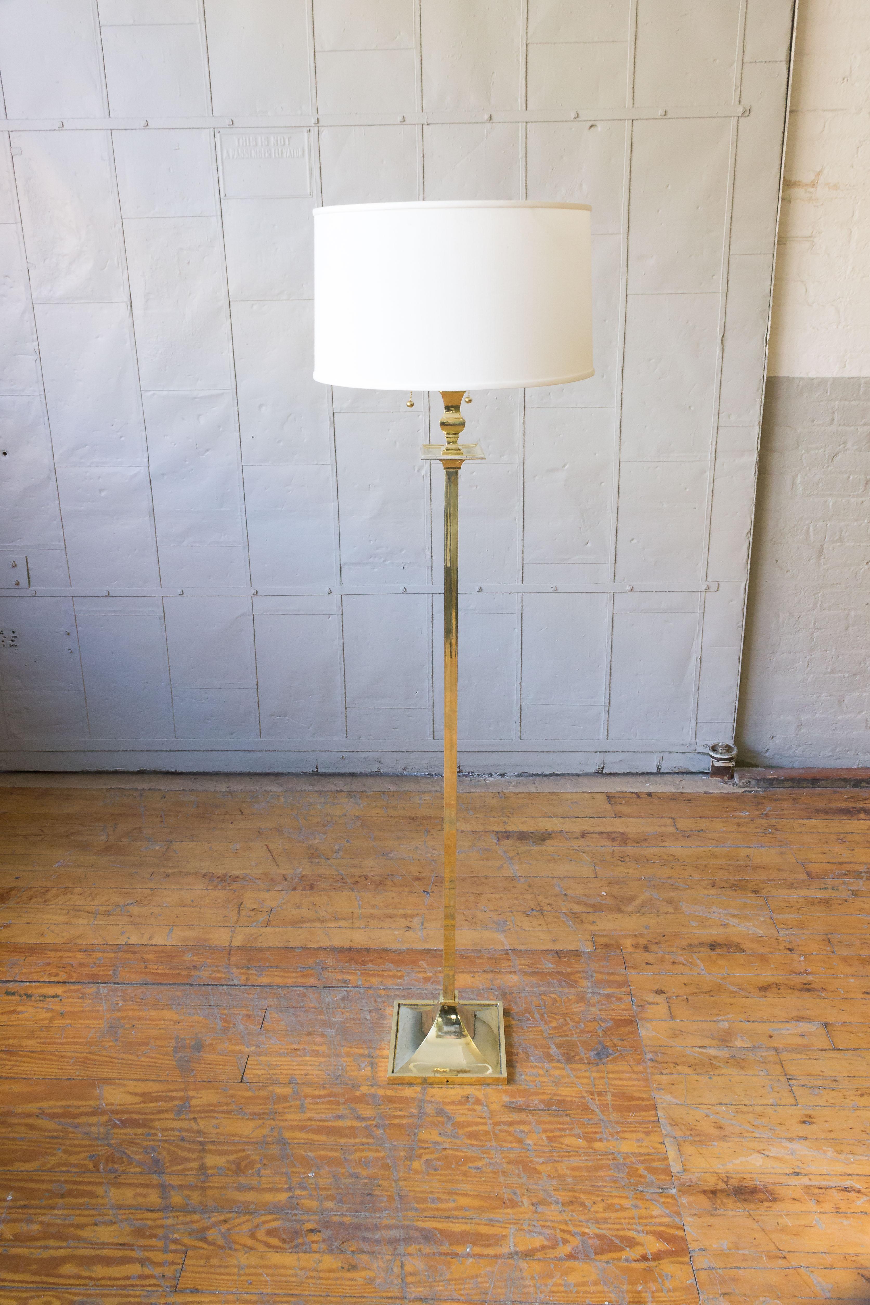 Pair of brass floor lamps with square base. Price includes polishing or plating and new wiring. Please allow 2 to 3 weeks for completion. Not sold with shade (photographed with 10 inch height x 18 inch diameter shade).