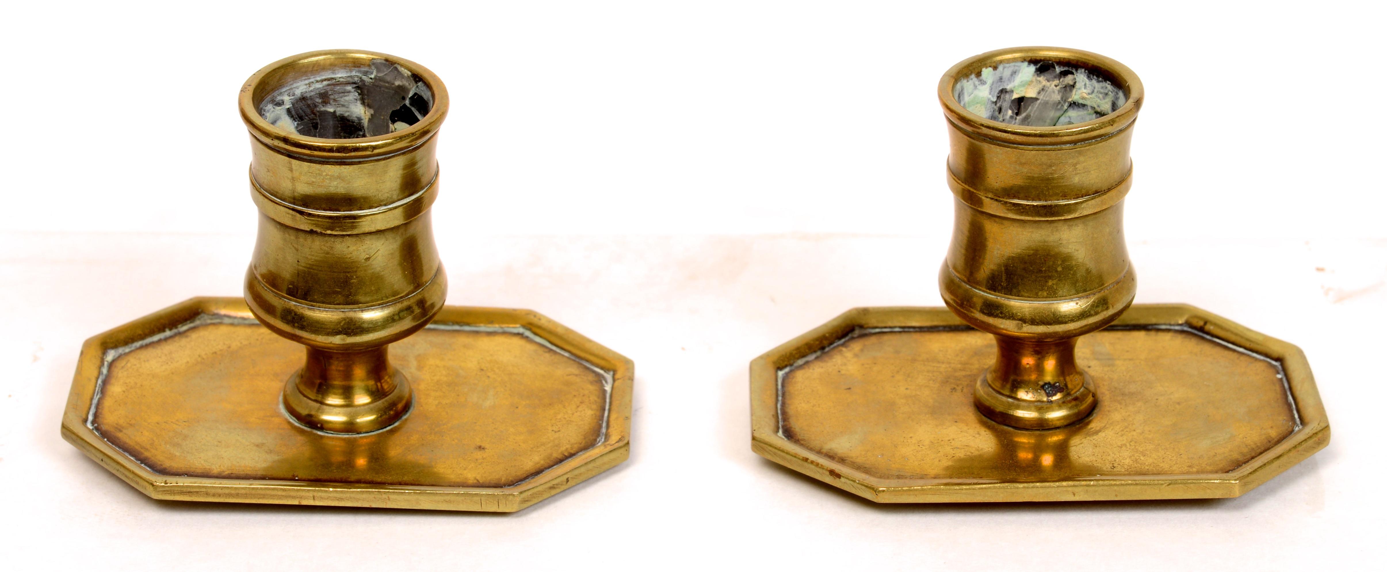 Pair of French brass tric trac game table candlesticks, Louis XVI c1780. Traditional construction with a peg which was inserted into a conforming hole on the table playing surface when the top was removed. Tric Trac candlesticks are hard to find,