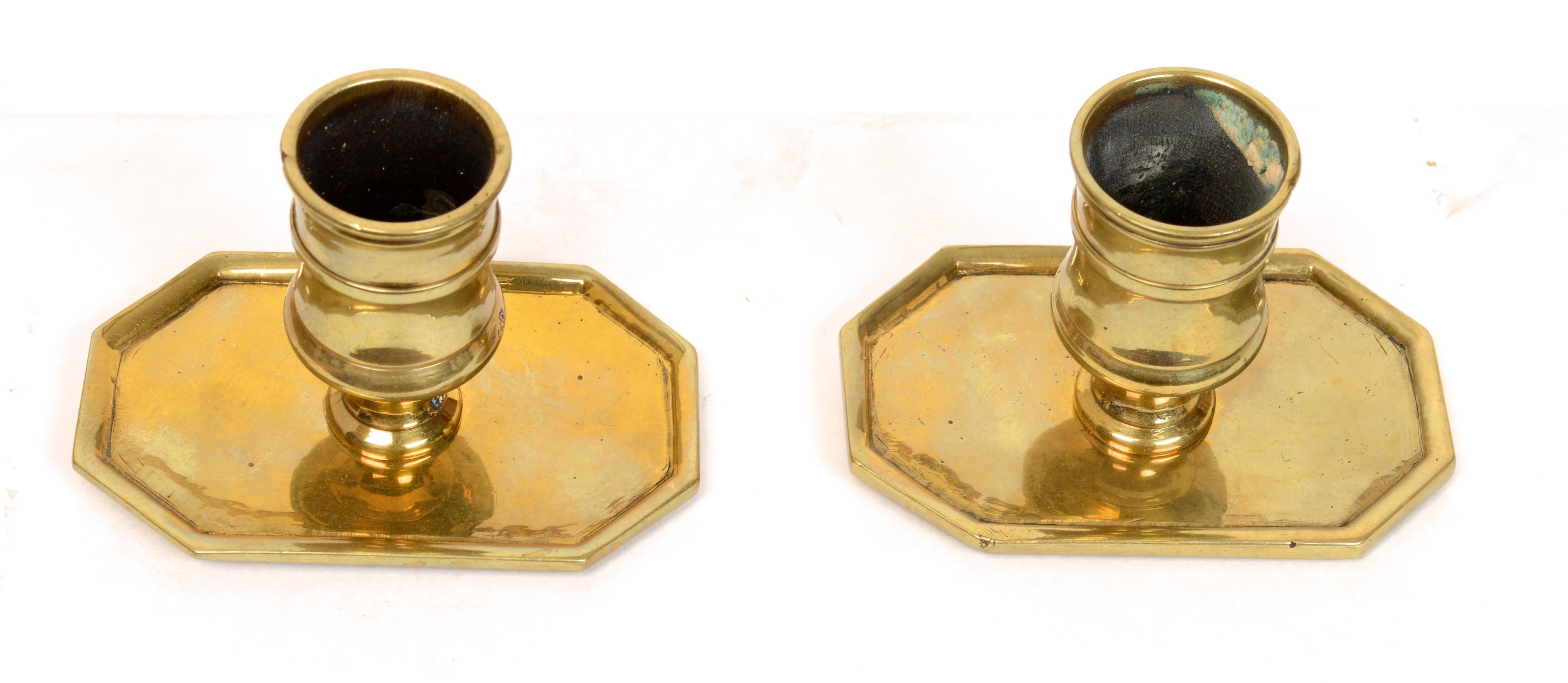 Pair of French brass tric trac game table candlesticks, Louis XVI c1780. Traditional construction with a peg which was inserted into a conforming hole on the table playing surface when the top was removed. Tric Trac candlesticks are hard to find,