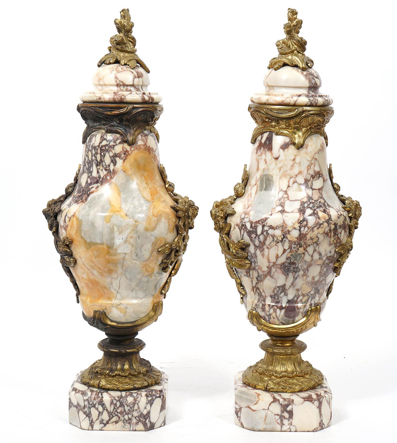 Pair of French marble and bronze mounted Cassolettes. 19th Ct., circa 1890's well detailed bronze mounts with beautiful rouge marble.