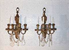 Paire d'appliques Caldwell de style Louis XV en bronze et cristal, vers 1930