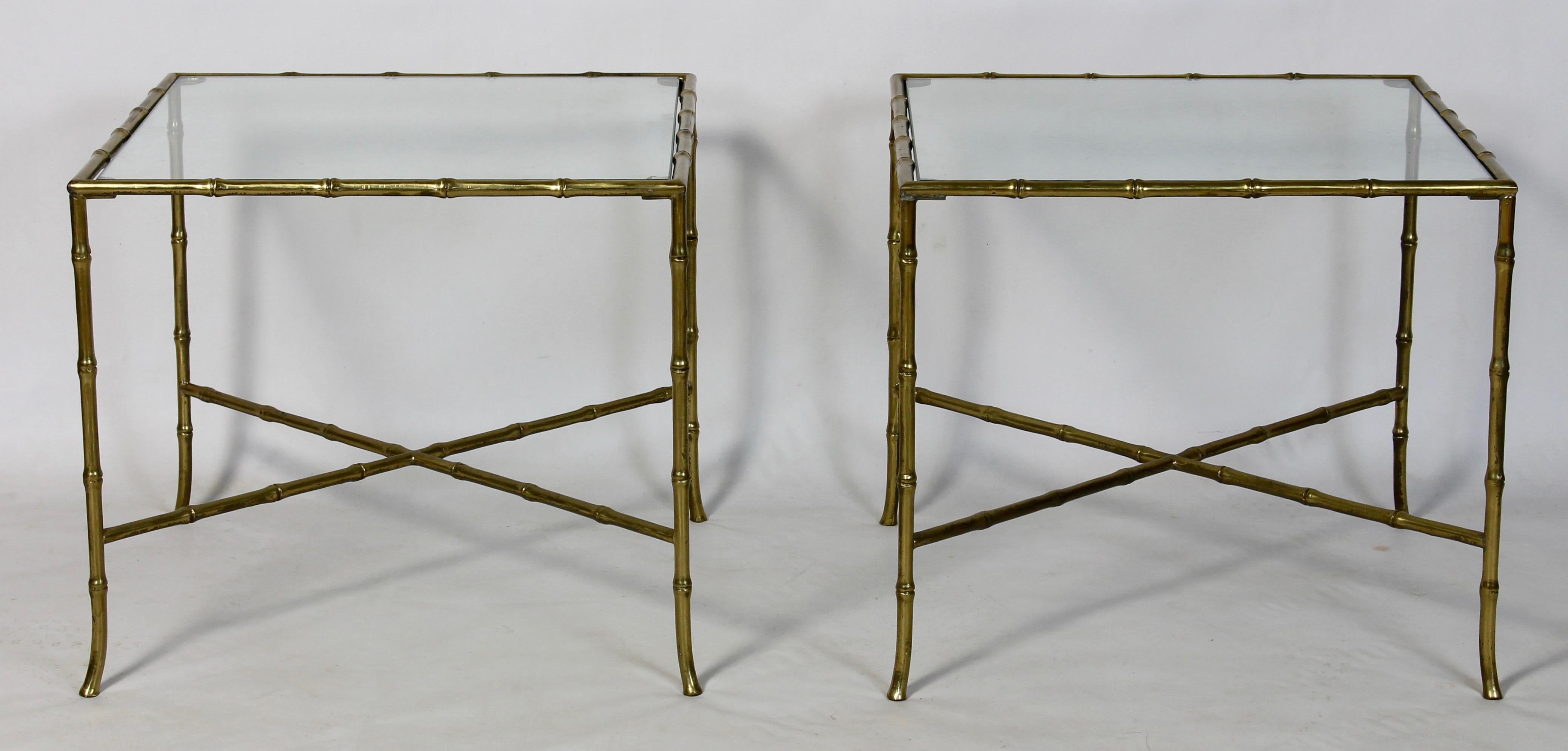 An elegant pair of mid-20th century. French cast gilt bronze faux bamboo occasional tables with inset glass tops.