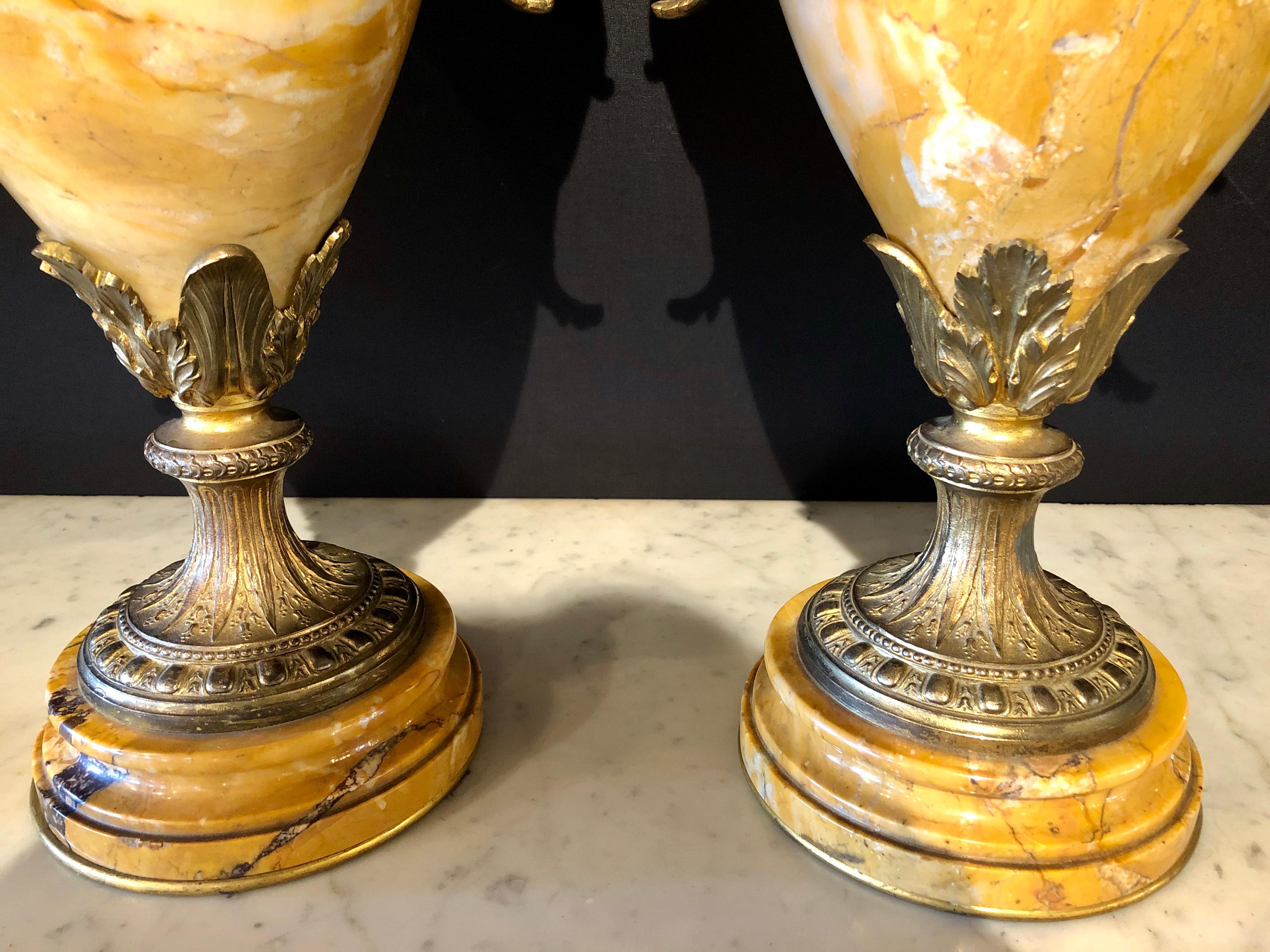 Pair of French Bronze and Marble Cassolettes Each with Cherubs 3