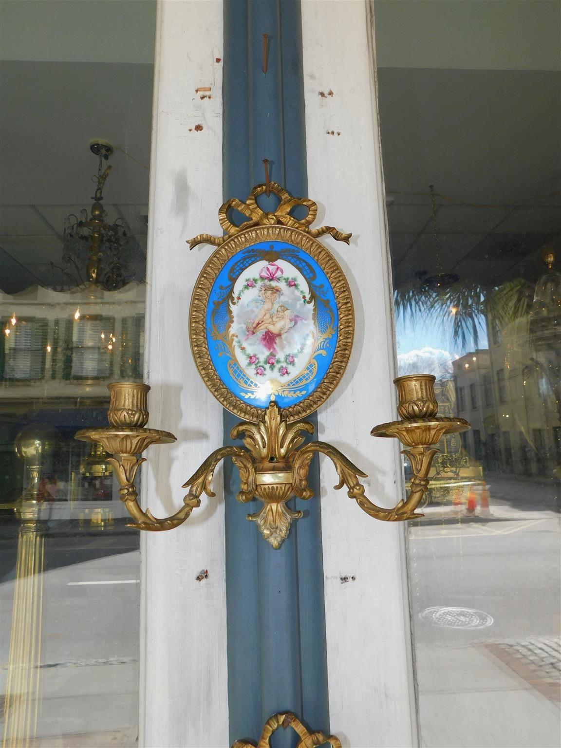 Cast Pair of French Bronze and Porcelain Sevres Foliage Ribbon Wall Sconces, C. 1820 For Sale