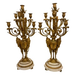 Pareja de candelabros franceses de bronce dorado y mármol de siete luces, Siglo XIX