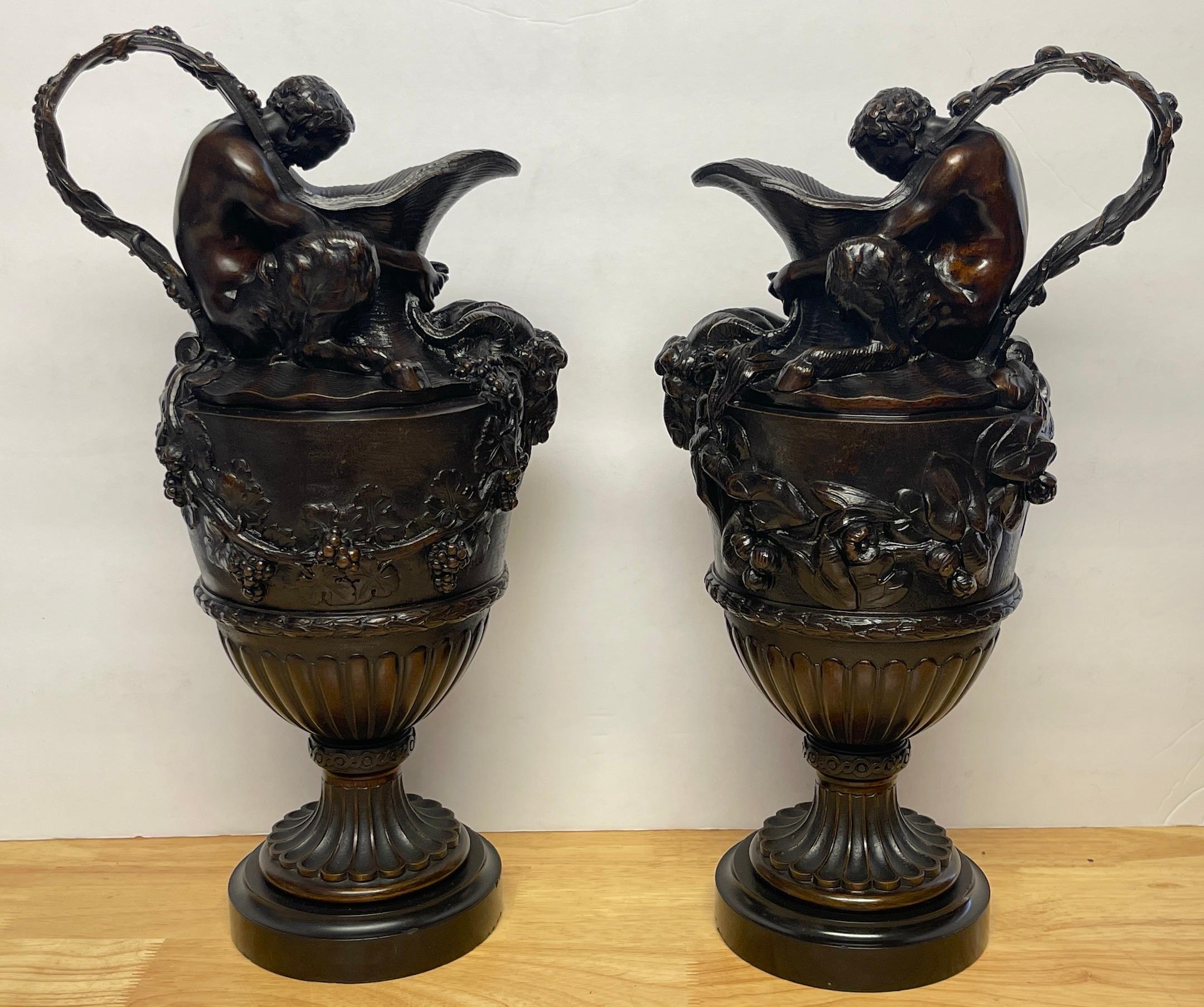 Neoclassical Pair of French Bronze Figural Ewers in the Manner of Claude Michael Clodion