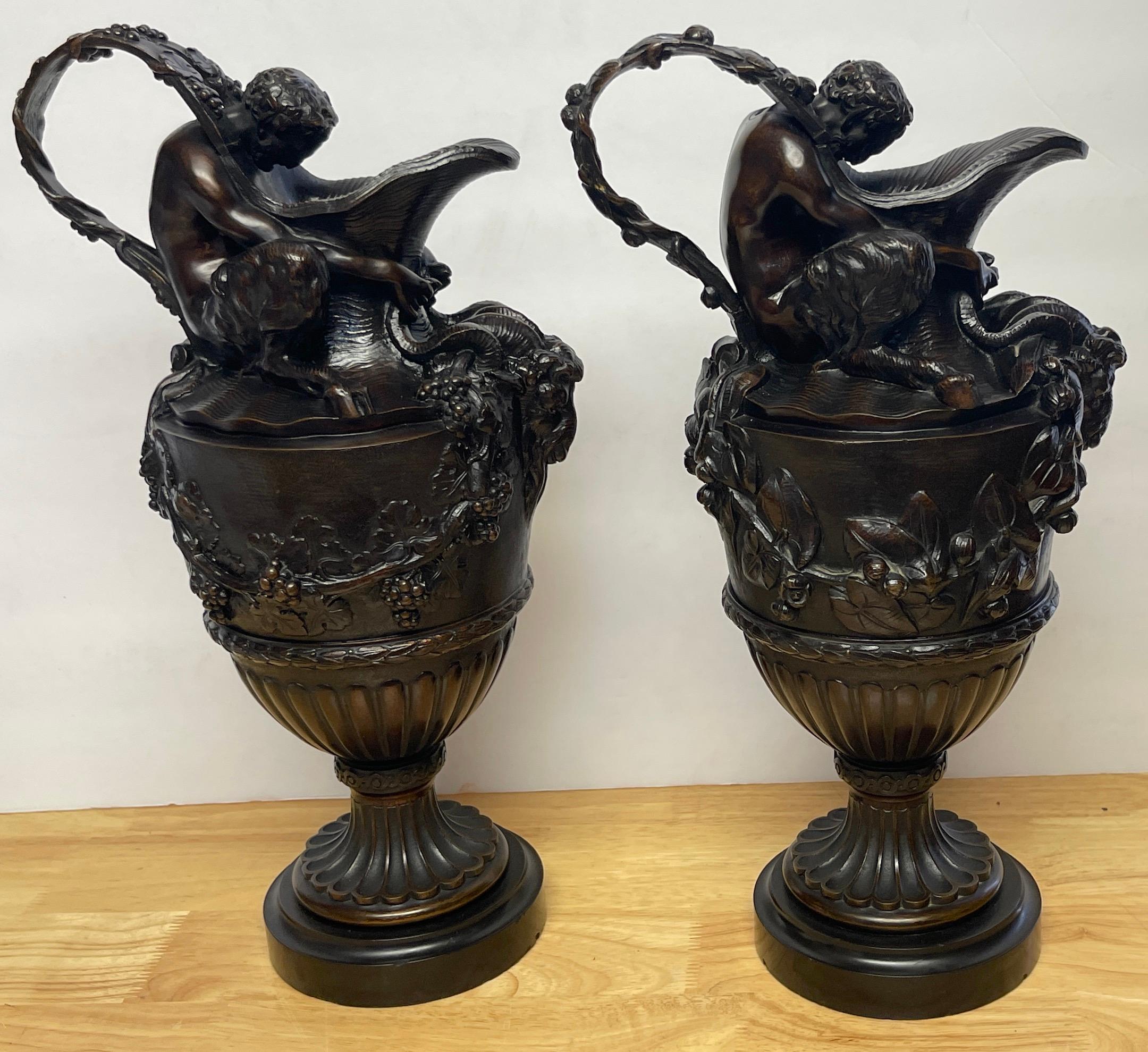 Pair of French Bronze Figural Ewers in the Manner of Claude Michael Clodion In Good Condition In West Palm Beach, FL