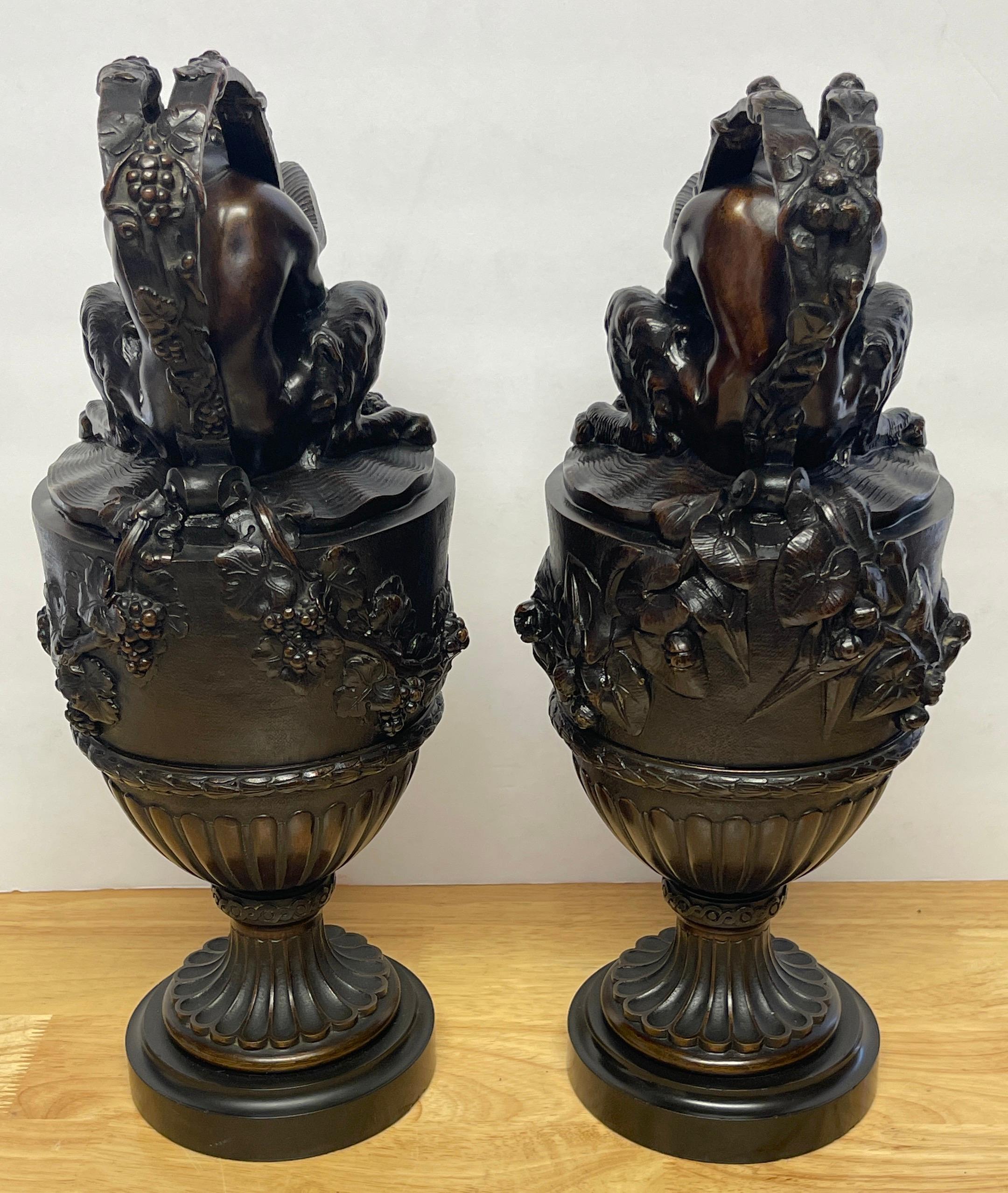 Pair of French Bronze Figural Ewers in the Manner of Claude Michael Clodion 1