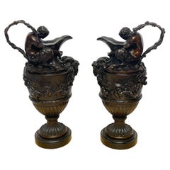 Pair of French Bronze Figural Ewers in the Manner of Claude Michael Clodion