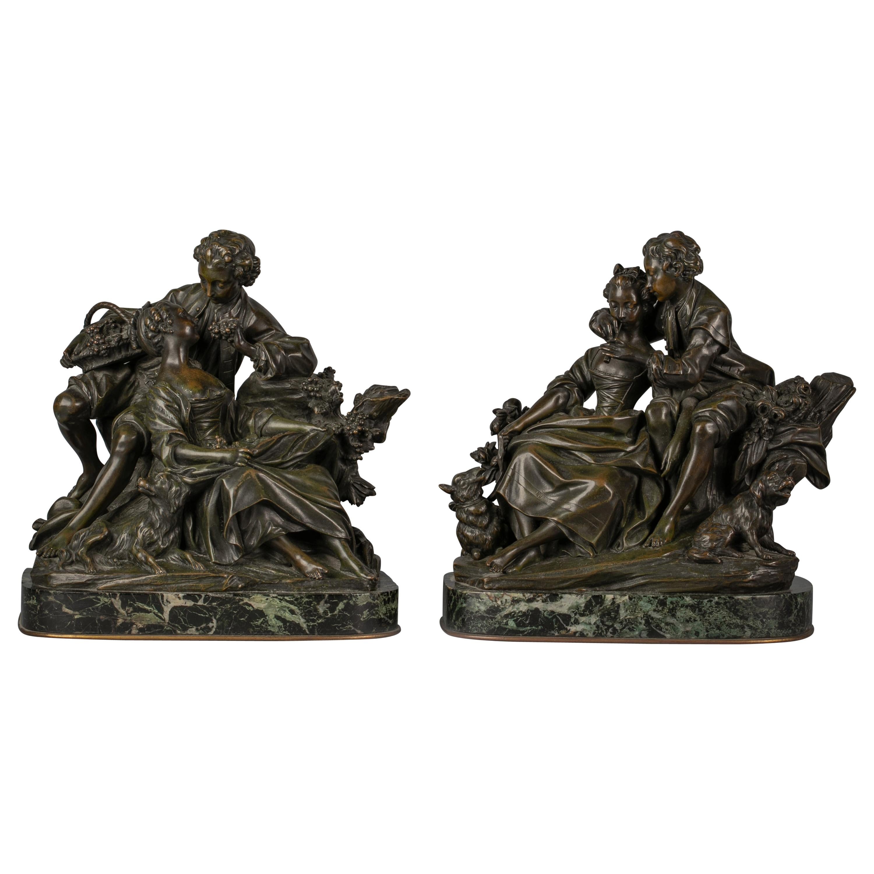 Paar französische Bronzefigurengruppeen der Traubenhändler und des Flötenlesson