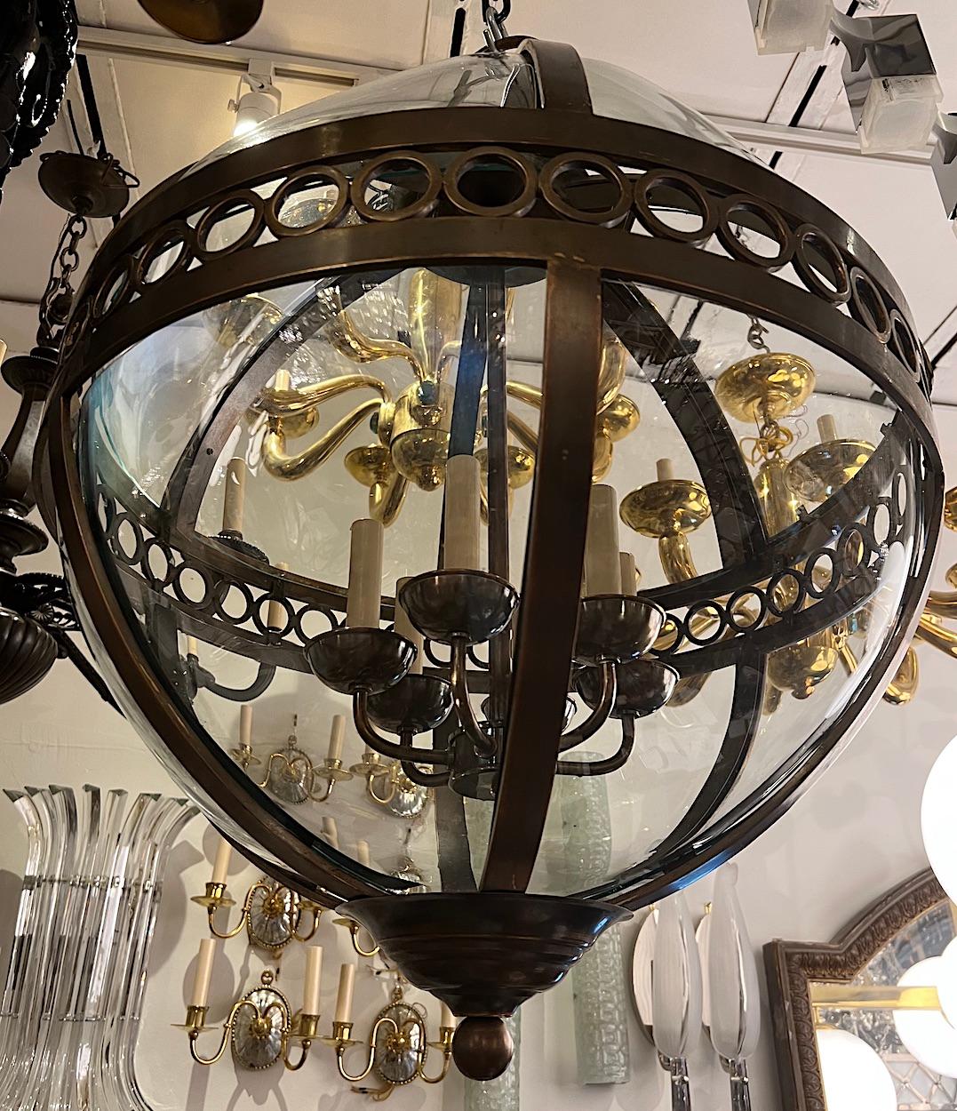 Pair of French Bronze Globe Lanterns. Sold Individually In Good Condition For Sale In New York, NY
