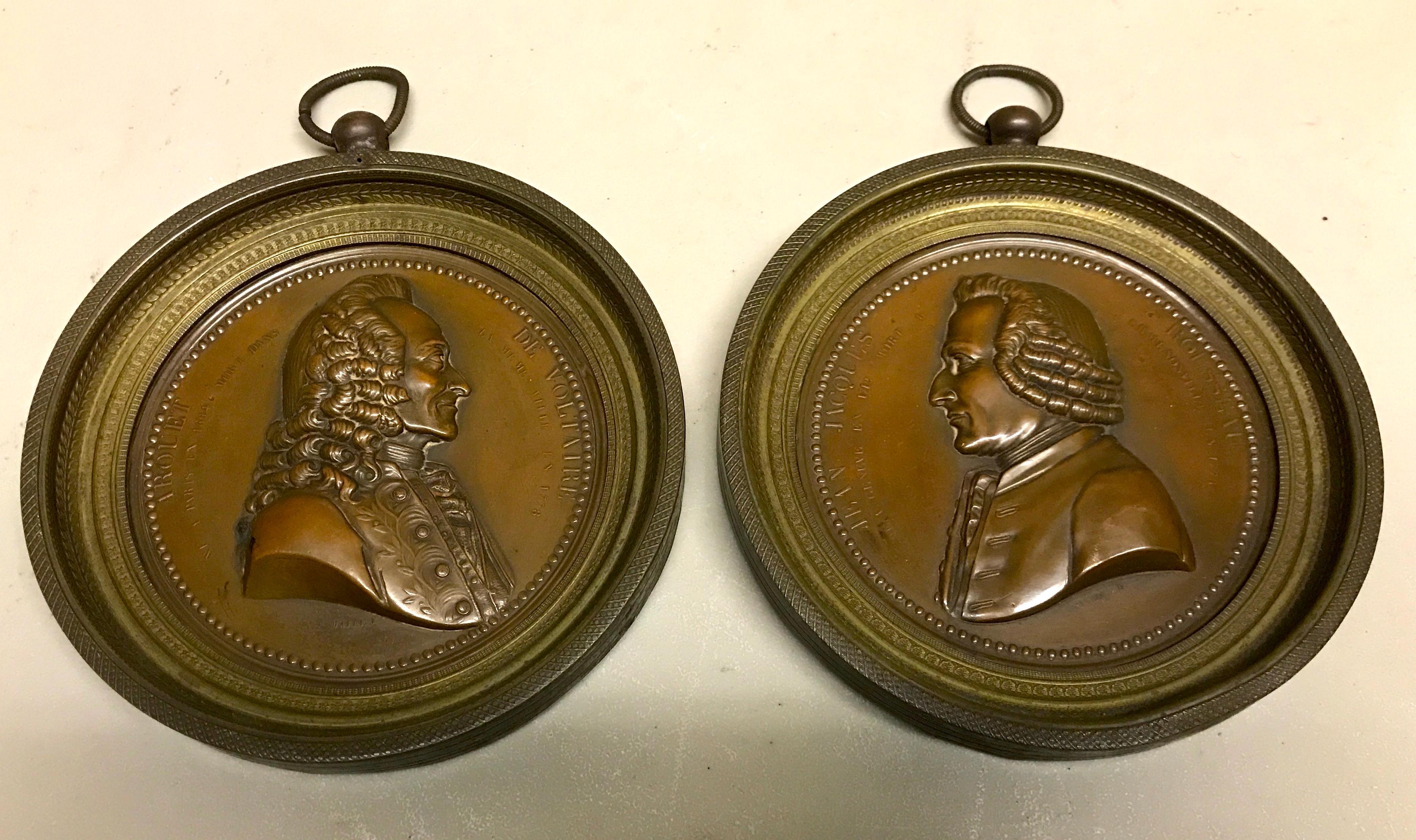 Pair of French bronze portrait plaques of Voltaire & Rouseau, Signed Marie F, Each one finely cast of a profile portrait of e Arouet de Voltaire, one Jean Jaques Rouseau.


 