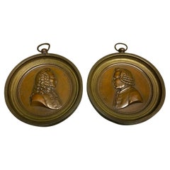 Pair of French Bronze Portrait Plaques of Voltaire & Rouseau, Signed Marie F