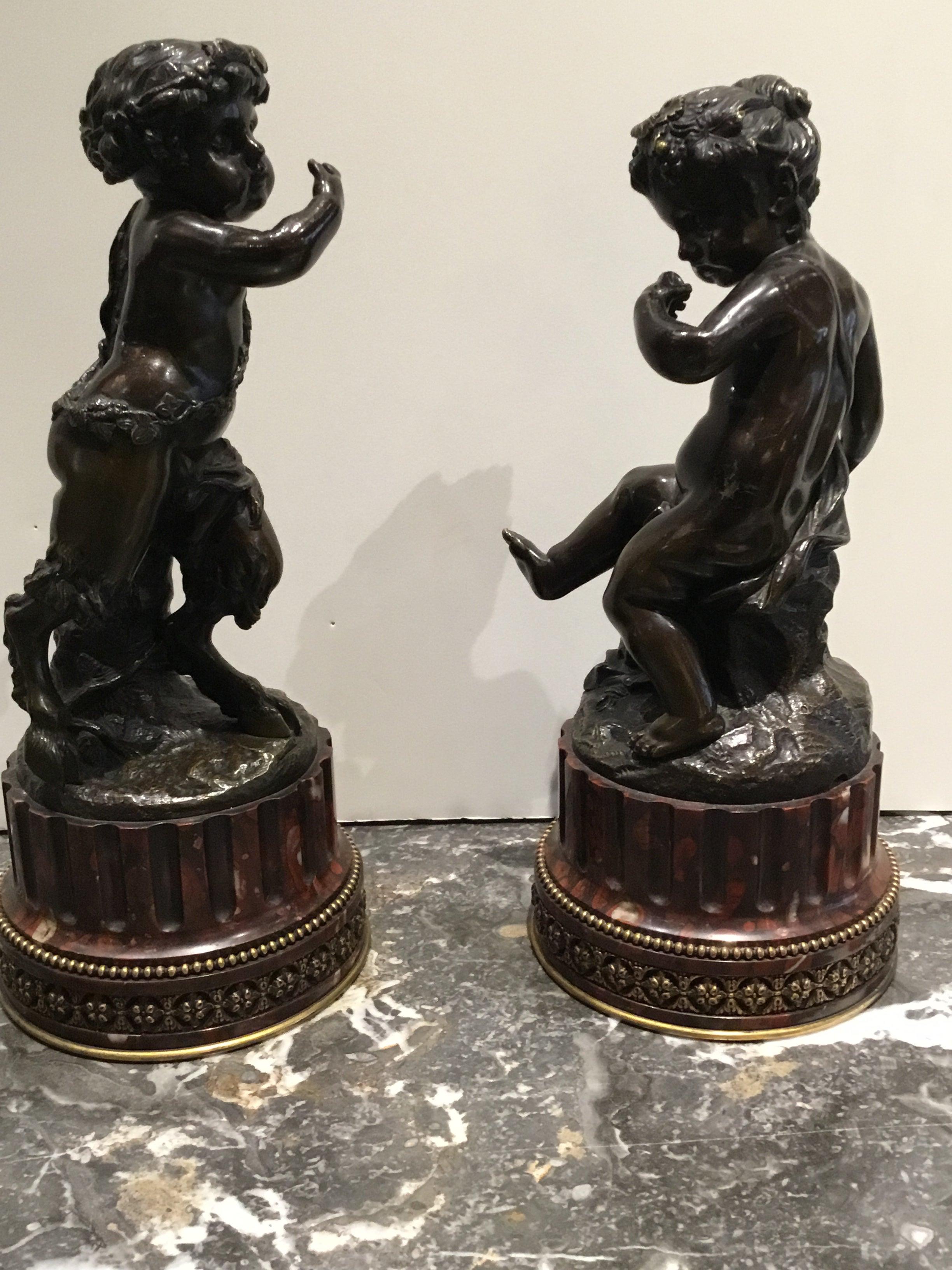 Coppia di sculture francesi in bronzo raffiguranti una ninfa e un satiro, firmate 