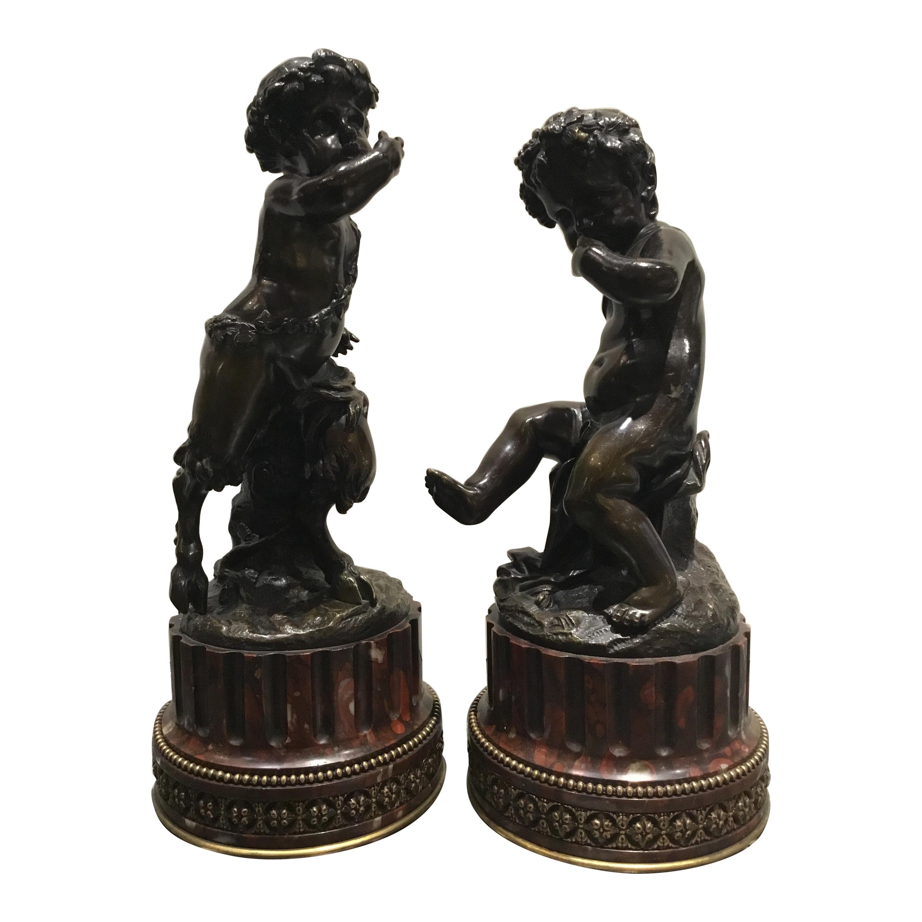 Paire de sculptures françaises en bronze d'une nymphes et d'un satyre signées « Clodion » 