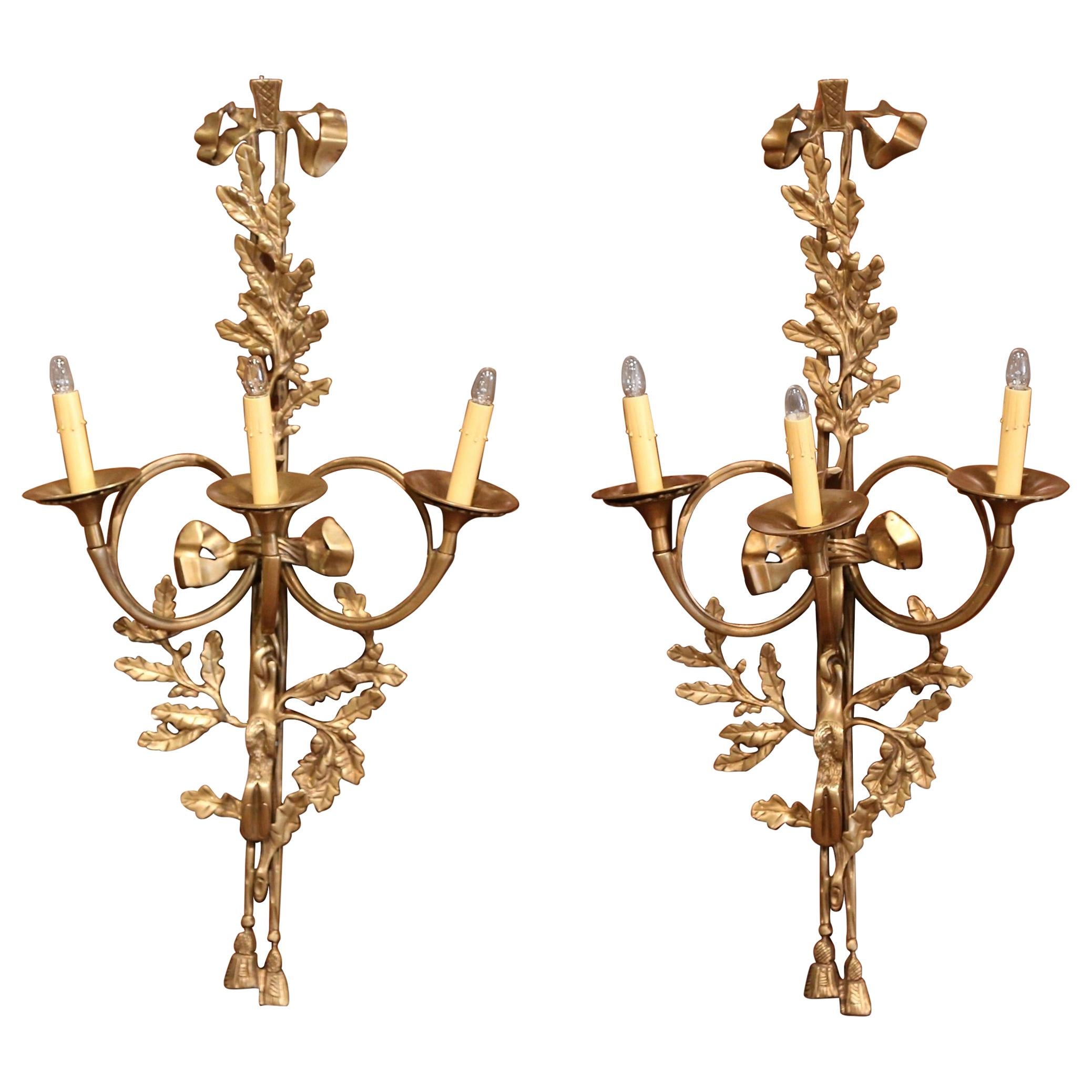 Pair of French Bronze Three-Arm Horn Wall Sconces with Bow and Hunt Motifs For Sale