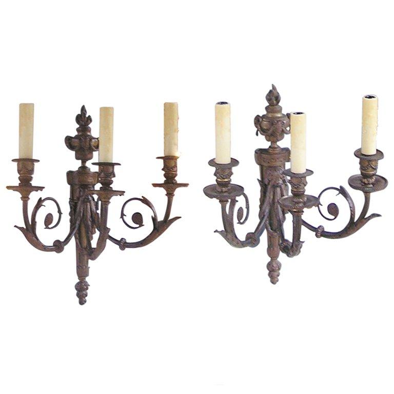 Pair of French Bronze Three Arm Sconces For Sale