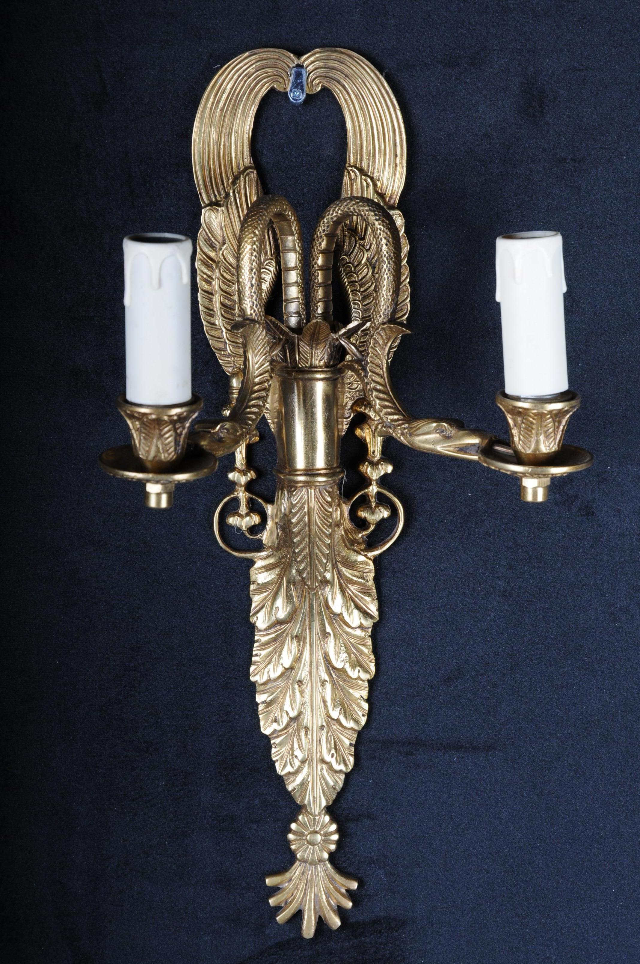 Pair of French bronze wall appliqués or sconces Empire style.

Bronze chased sconces. Spine shield starting from 2 designed as fully plastic snake’s lighthouses.

(F-Hud-24).