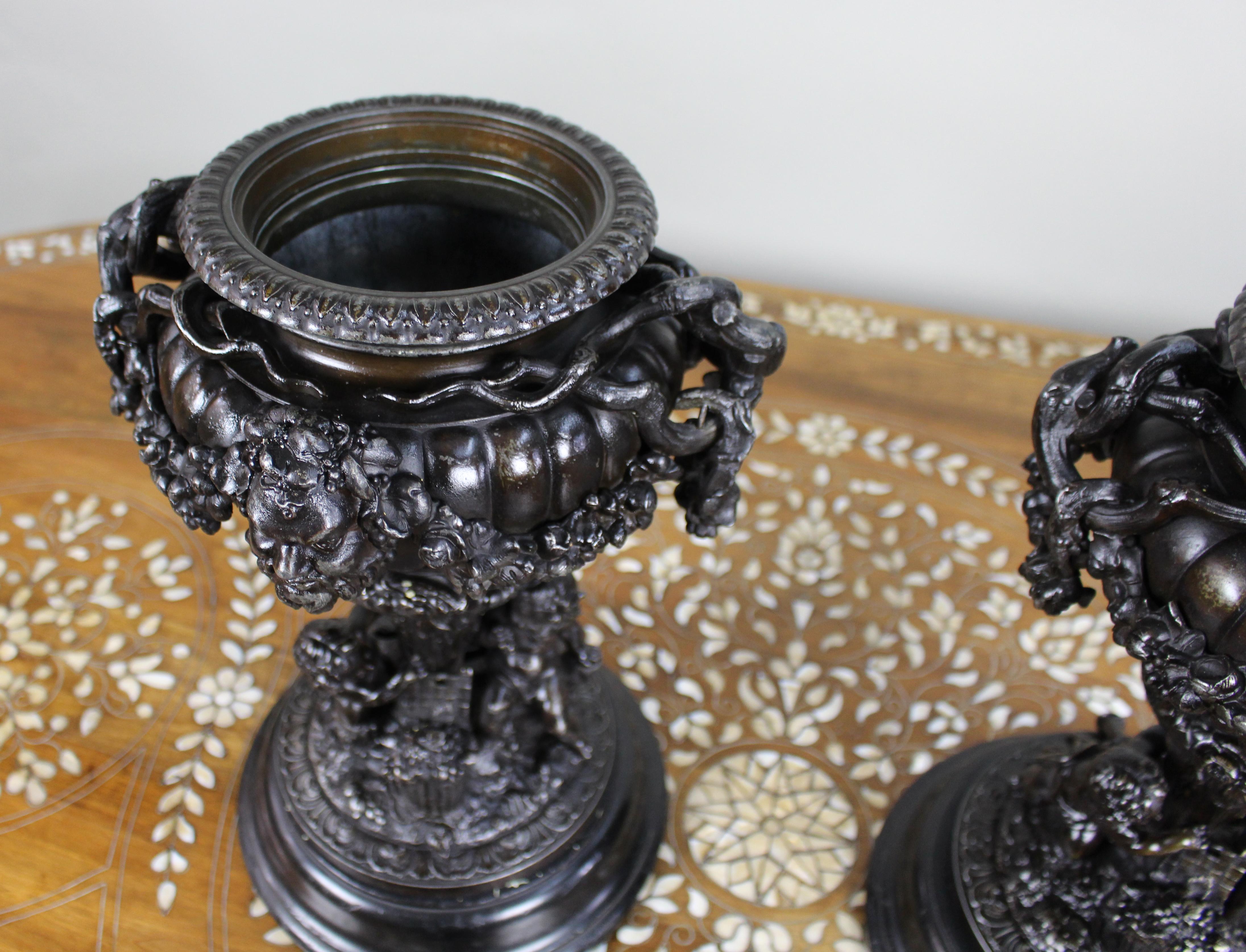Pair of French Bronzed Spelter Urns with Bacchic Masks and Putti, Circa 1880 For Sale 6