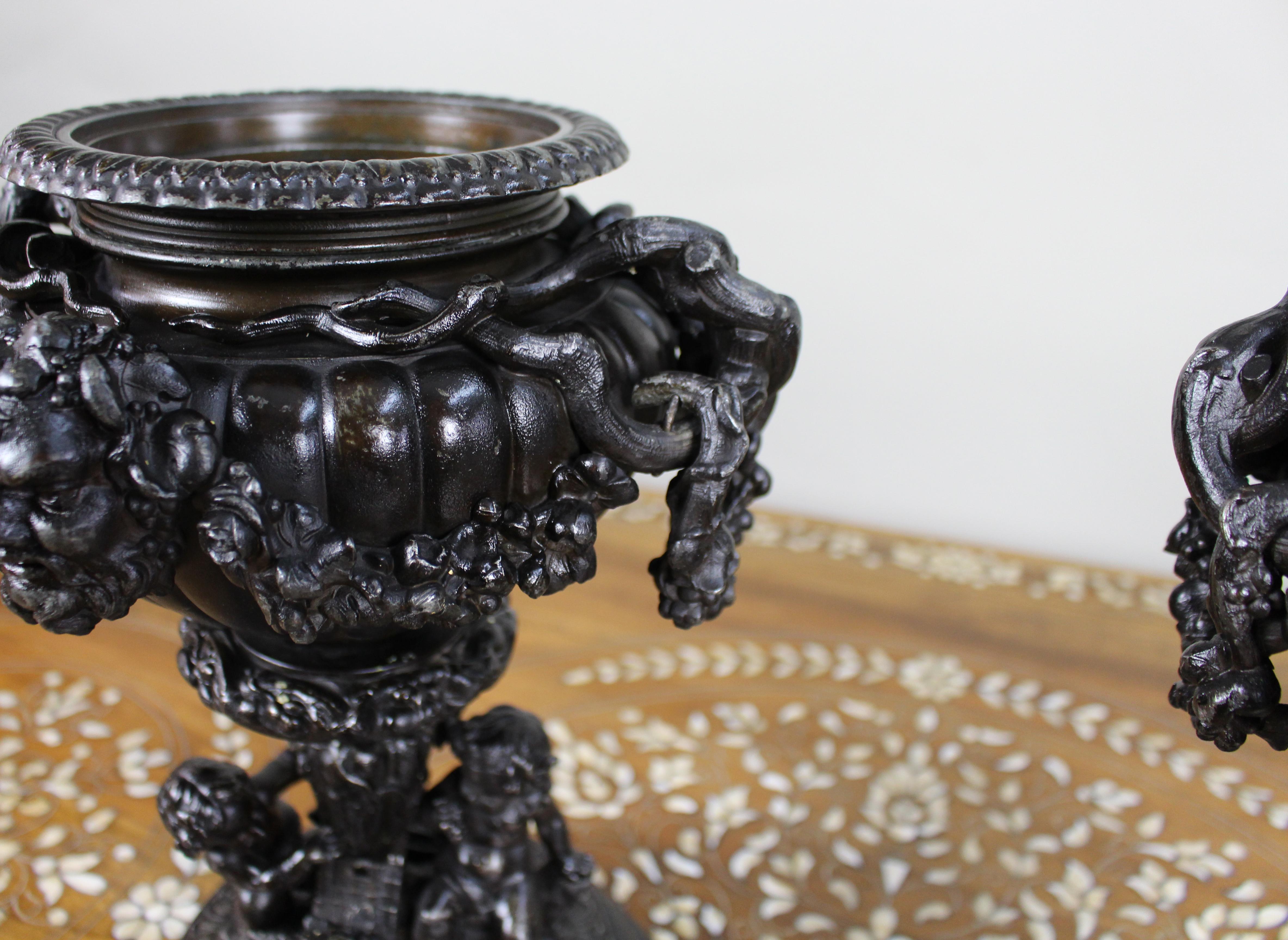Pair of French Bronzed Spelter Urns with Bacchic Masks and Putti, Circa 1880 For Sale 7