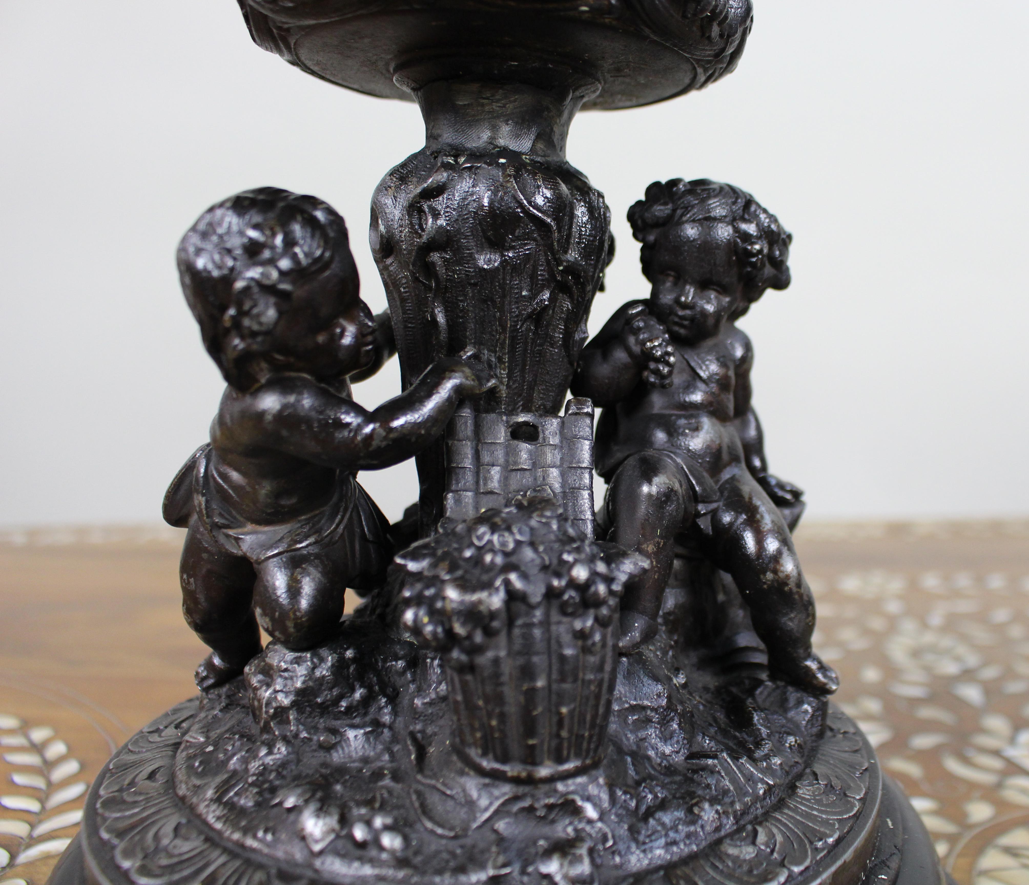 Pair of French Bronzed Spelter Urns with Bacchic Masks and Putti, Circa 1880 For Sale 11