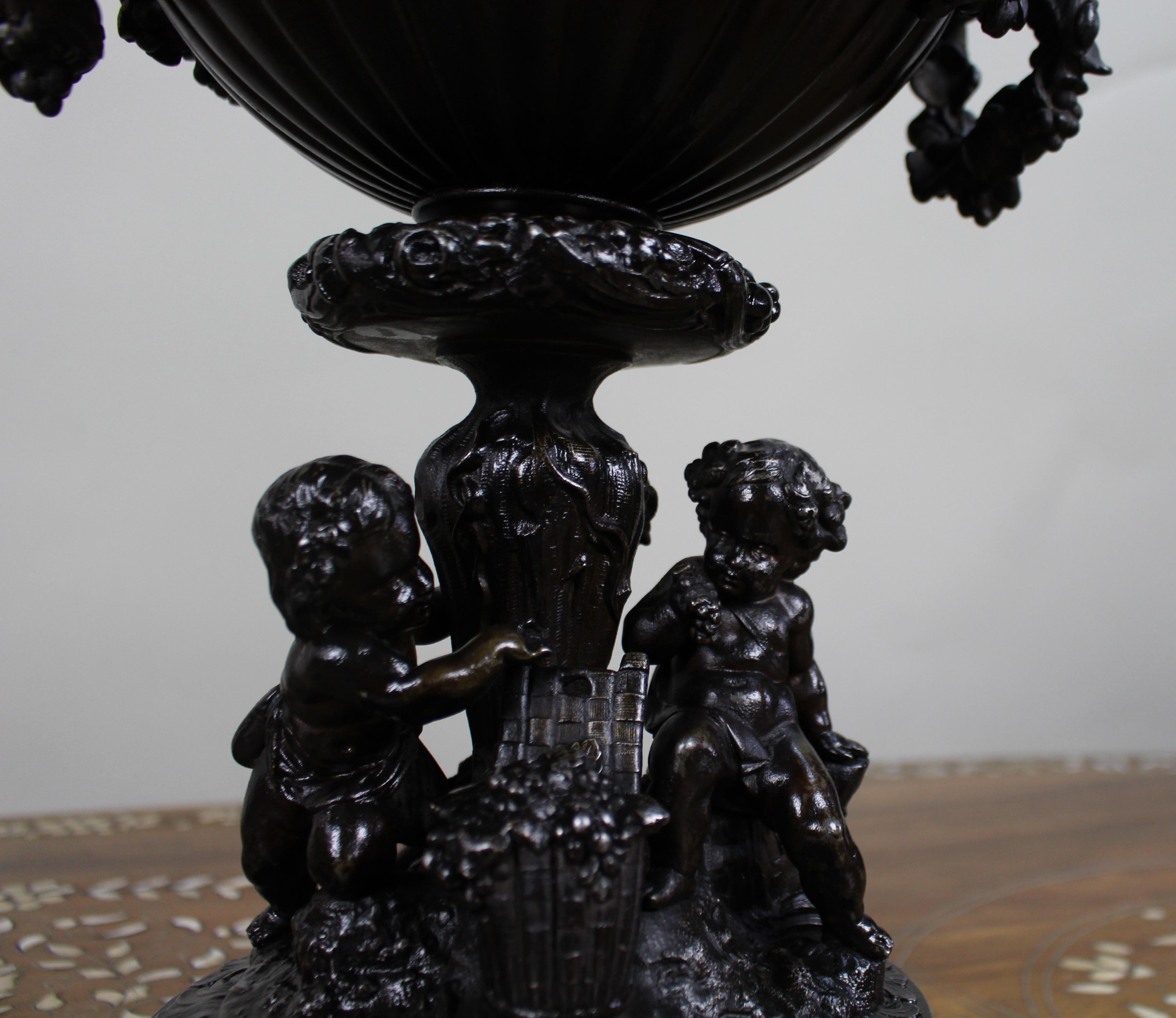 Pair of French Bronzed Spelter Urns with Bacchic Masks and Putti, Circa 1880 For Sale 14