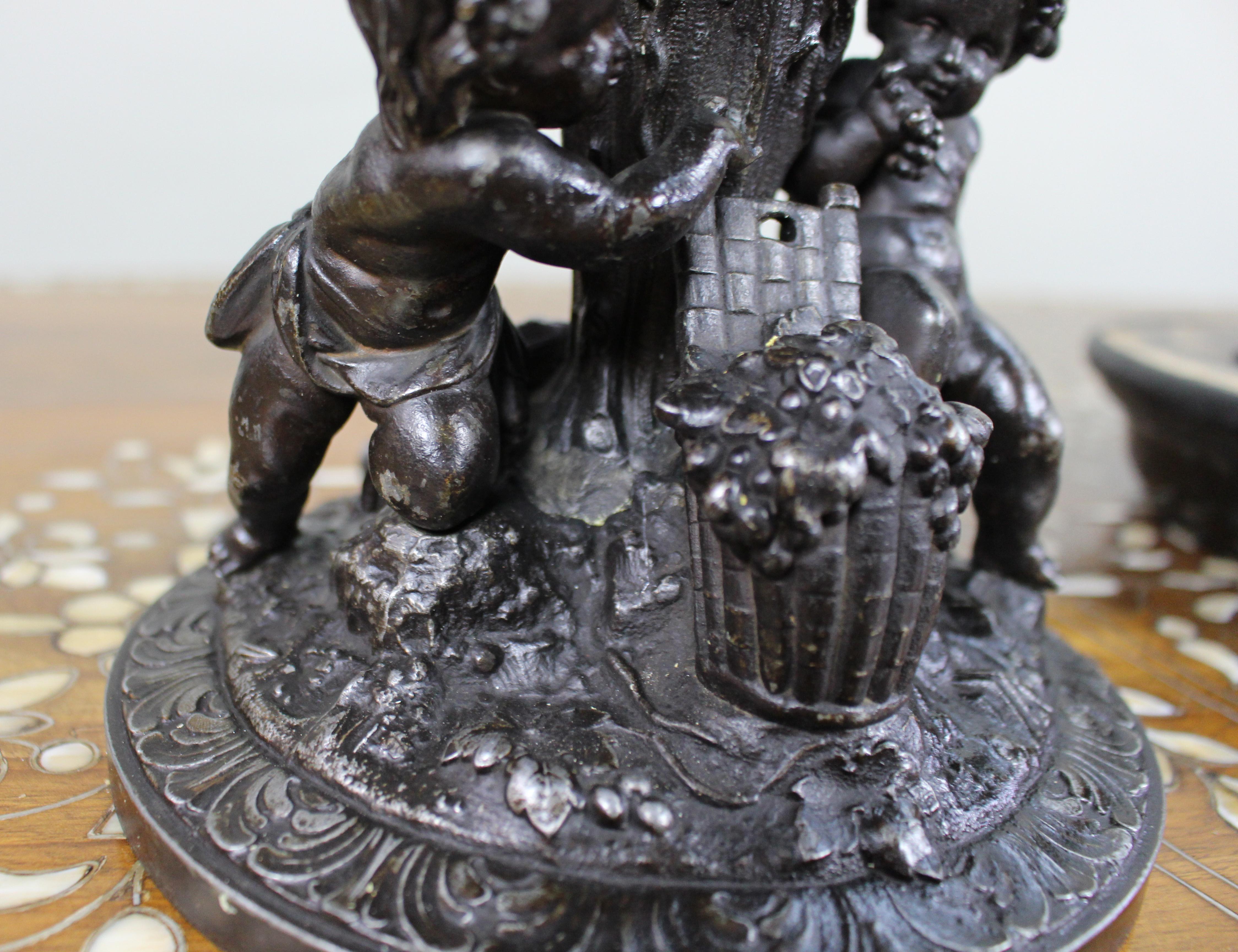 Pair of French Bronzed Spelter Urns with Bacchic Masks and Putti, Circa 1880 For Sale 15