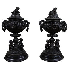 Pair of French Bronzed Spelter Urns with Bacchic Masks and Putti, Circa 1880