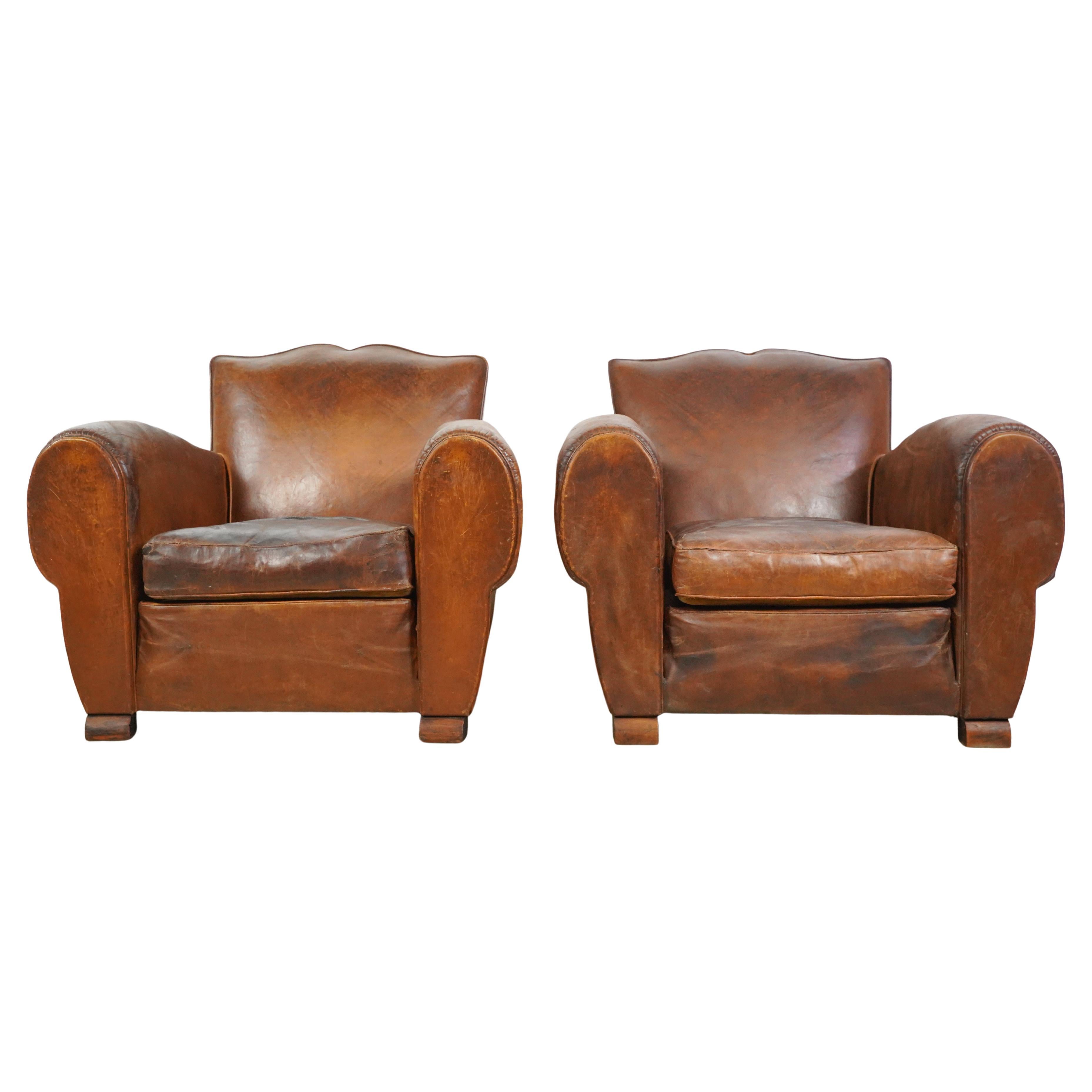 Pair of French Brown Leather Moustache Club Chairs