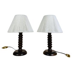 Pair of French brutalist wooden table lamps, Charles Dudouyt style