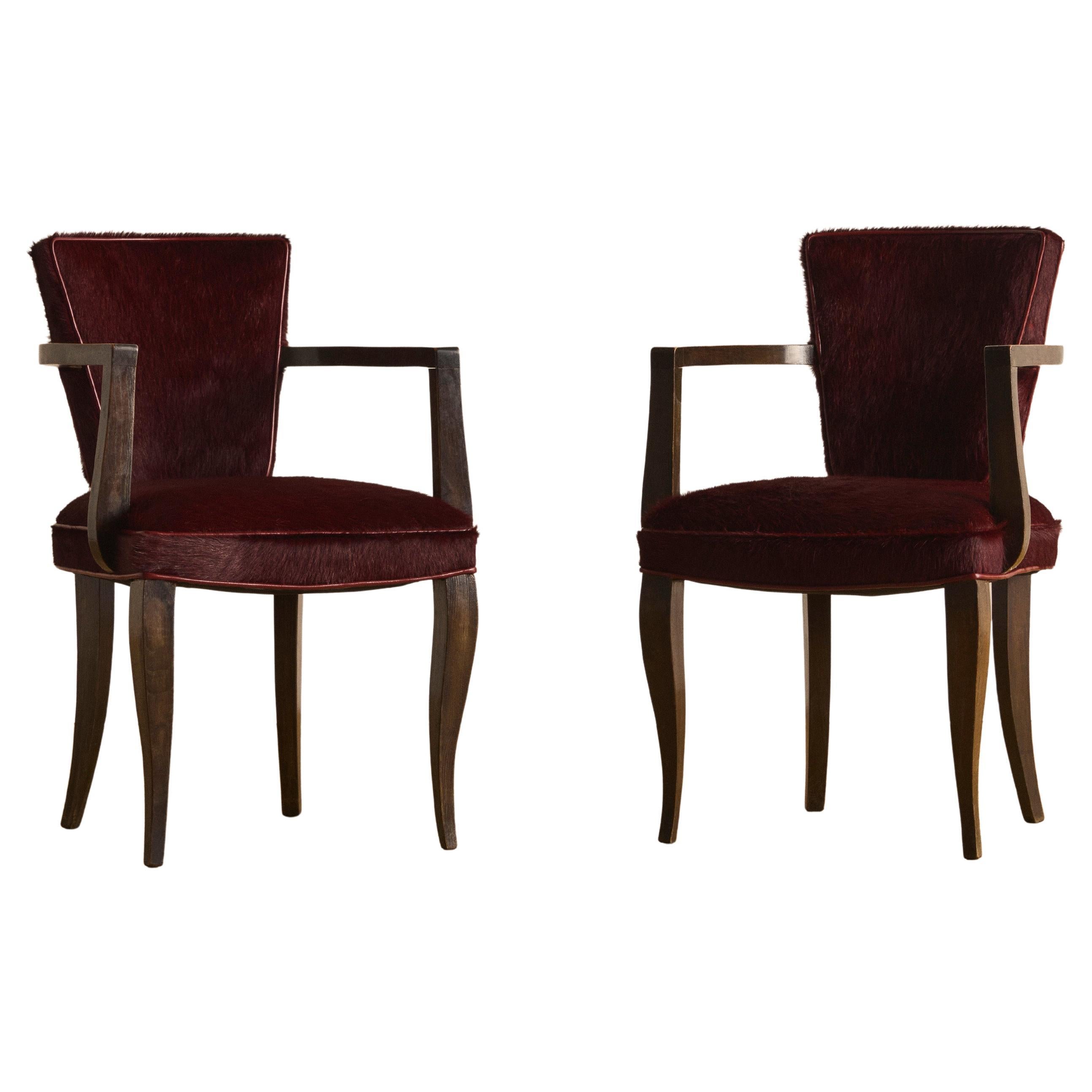 Pair of French Burgundy Cowhide and Wood Arm Chairs c. 1940 For Sale