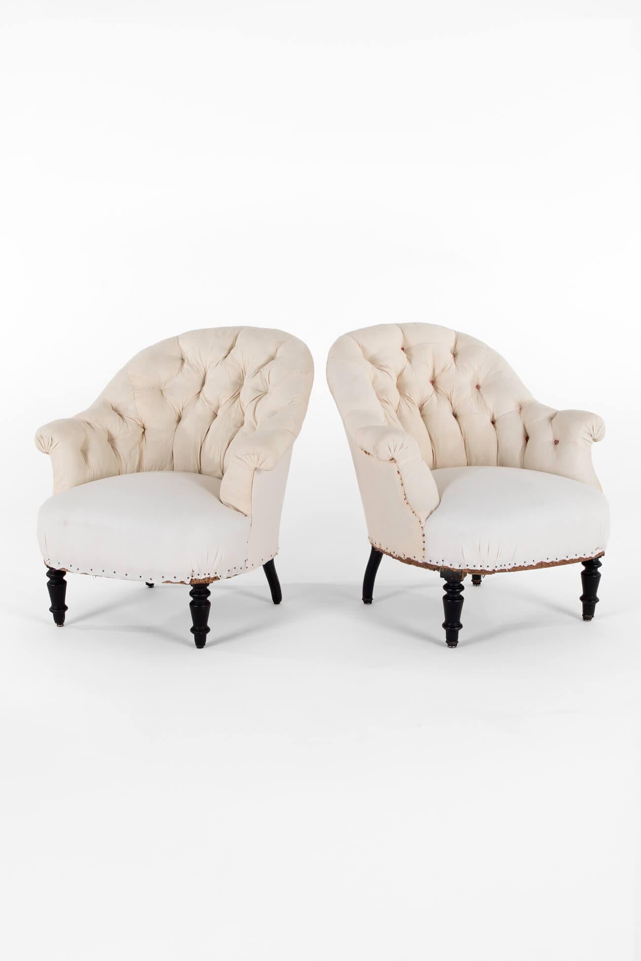 A pretty pair of French button-back armchairs in calico.

The chair’s seats have been fully restored, stripped back to the original solid walnut pegged frame with a new coil spring base, padding, hessian lining, and calico coverings added to the