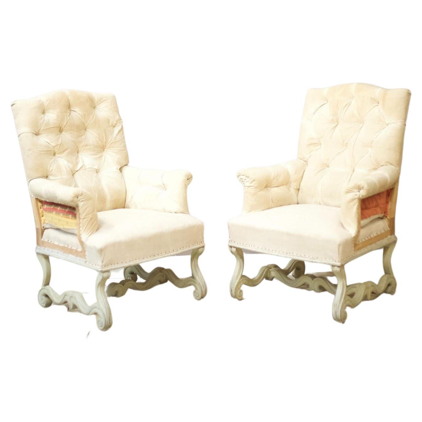 Pair of French Buttoned Armchairs with Carved Frame