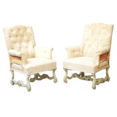Pair of French Buttoned Armchairs with Carved Frame