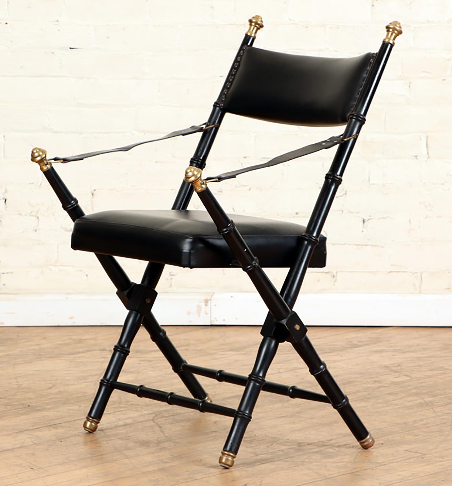 Pair of French Campaign-Style Folding Chairs with Faux-Bamboo Frames.
Two sets of the pair are available.