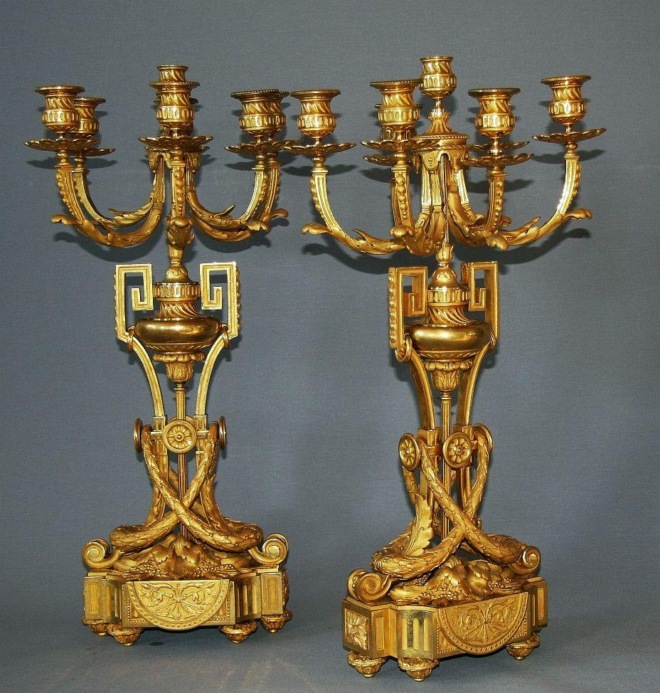 Pair of gilded, transition style, French candelabras with seven branches. Paris Napoleon III, circa 1850, France.
  